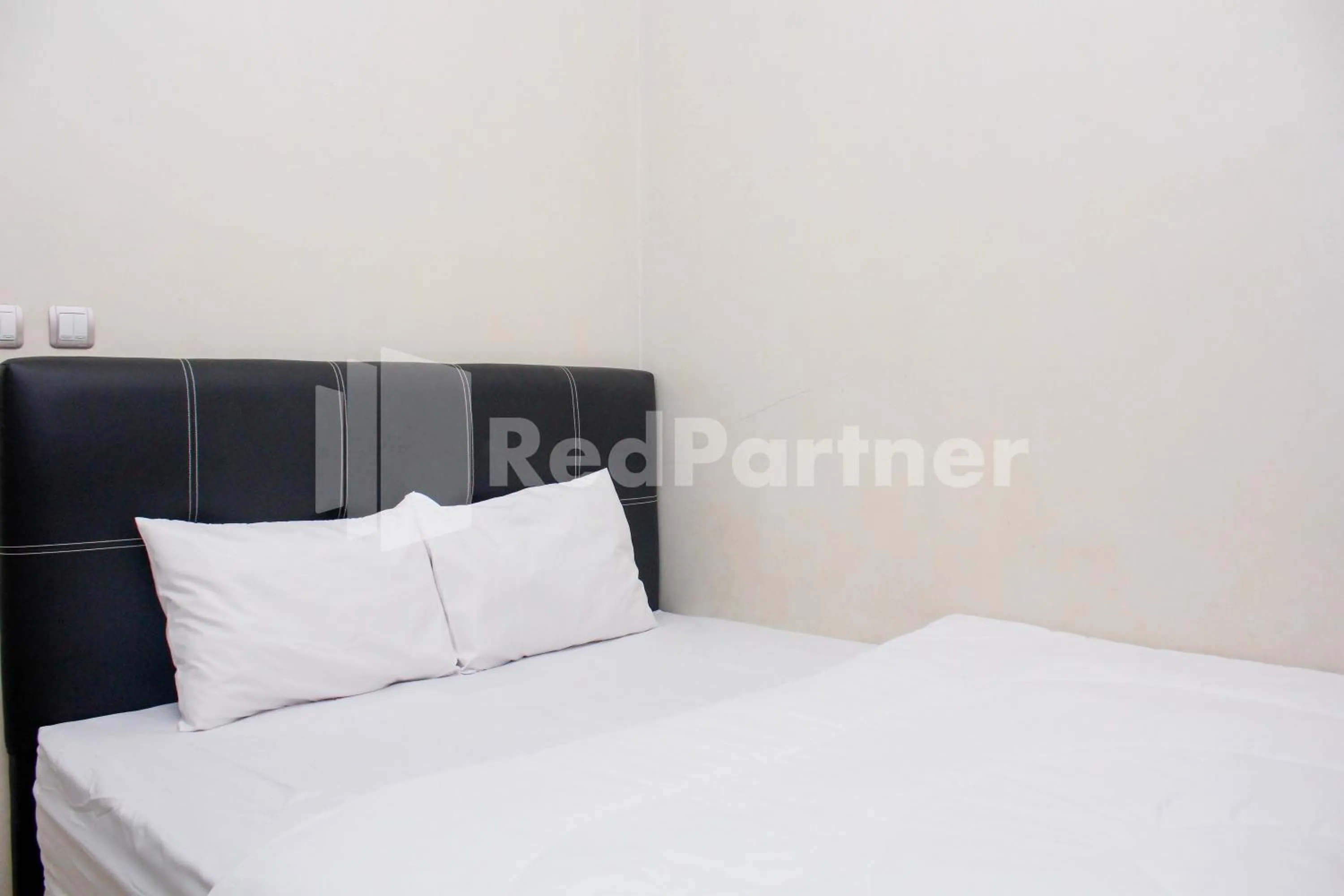 Bed in Hotel Baby Angel Dieng Mitra RedDoorz