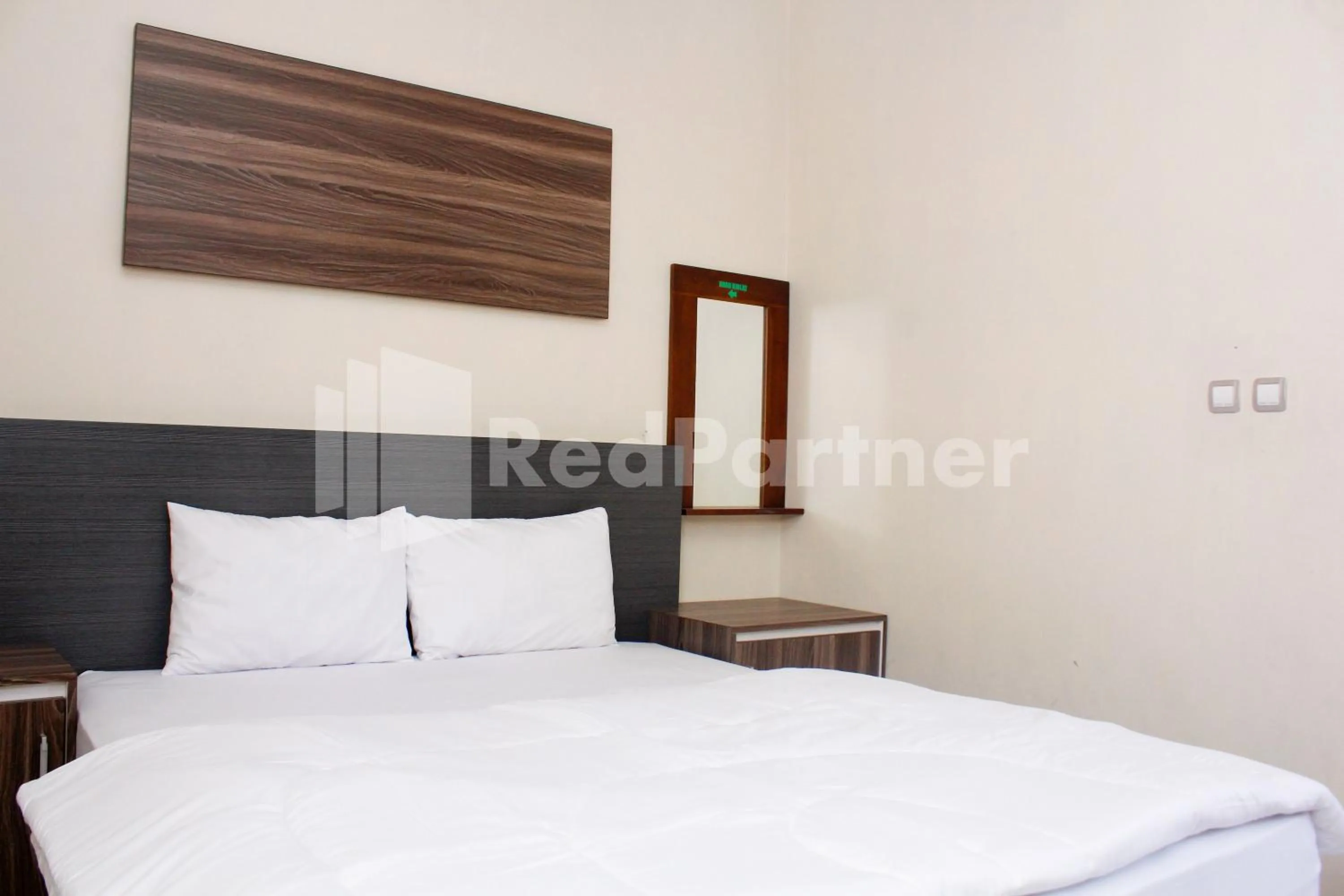 Bed in Hotel Baby Angel Dieng Mitra RedDoorz