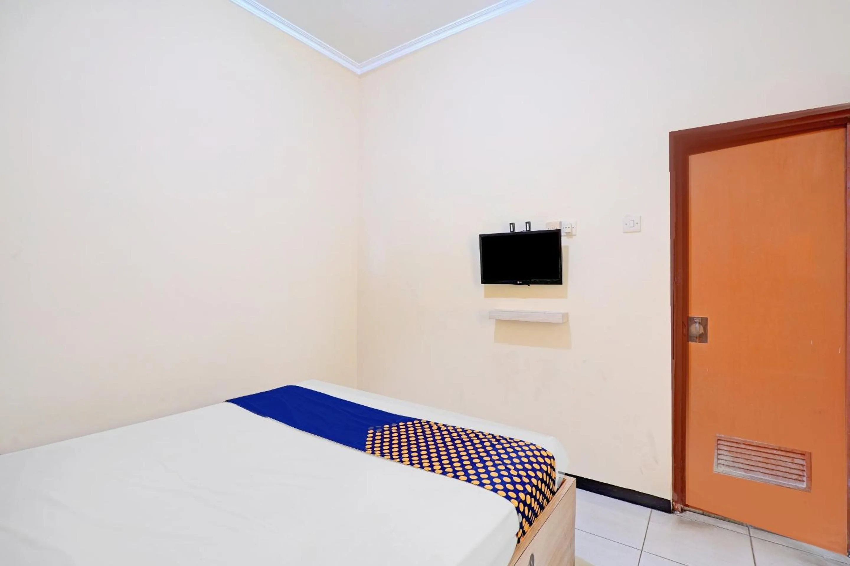 Bedroom in OYO 90622 Hotel Galaksi