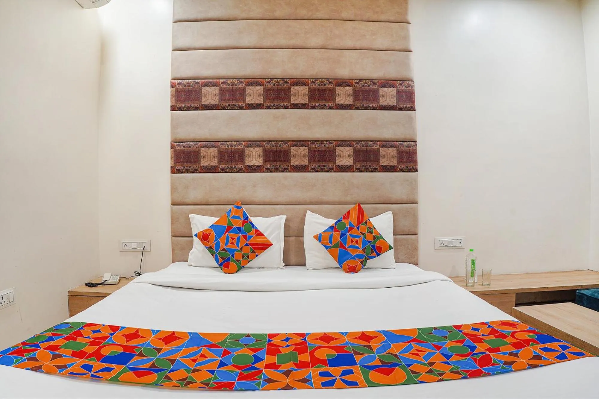 Bed in FabHotel Prime OM Palace