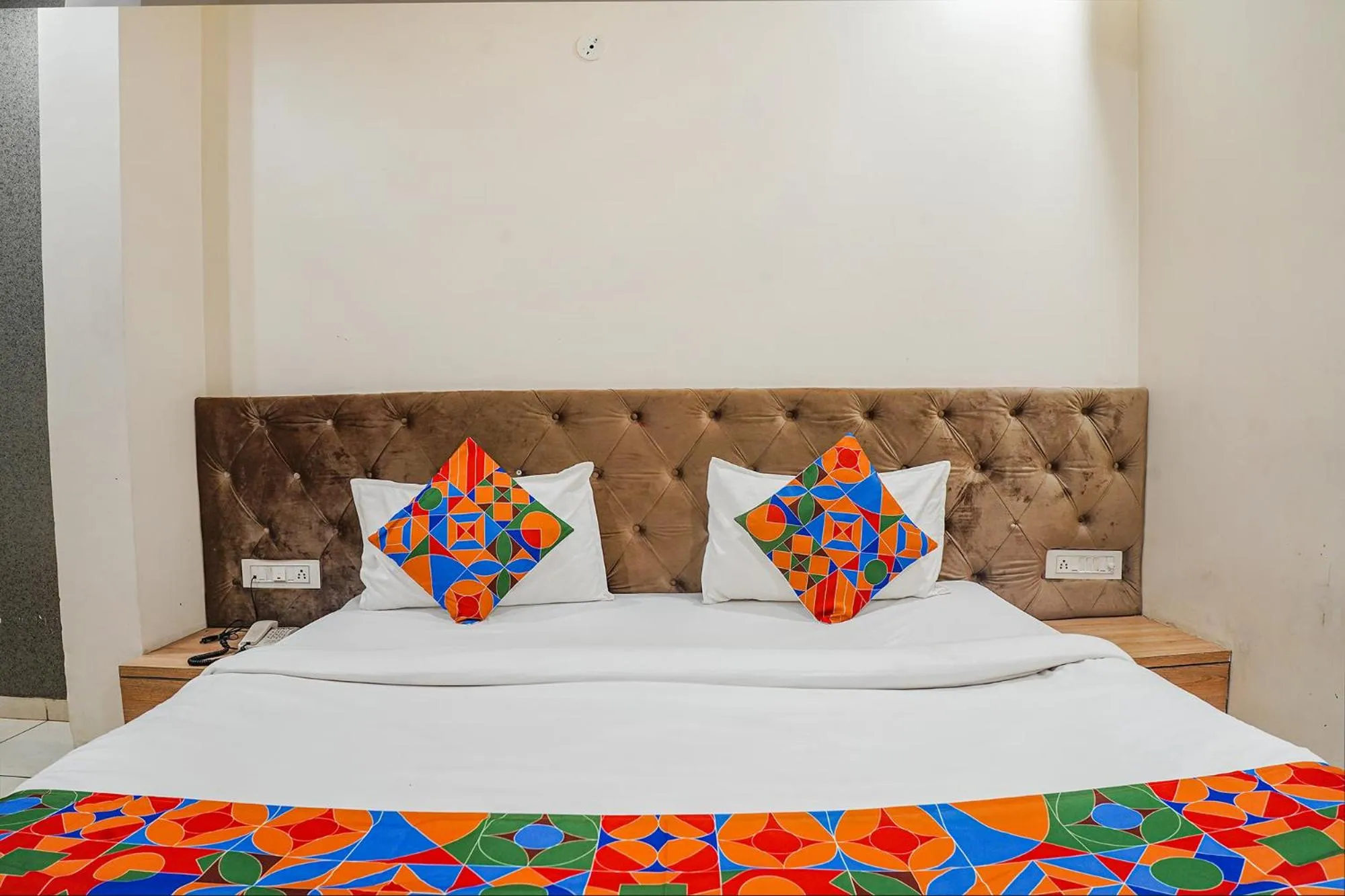 Bed in FabHotel Prime OM Palace