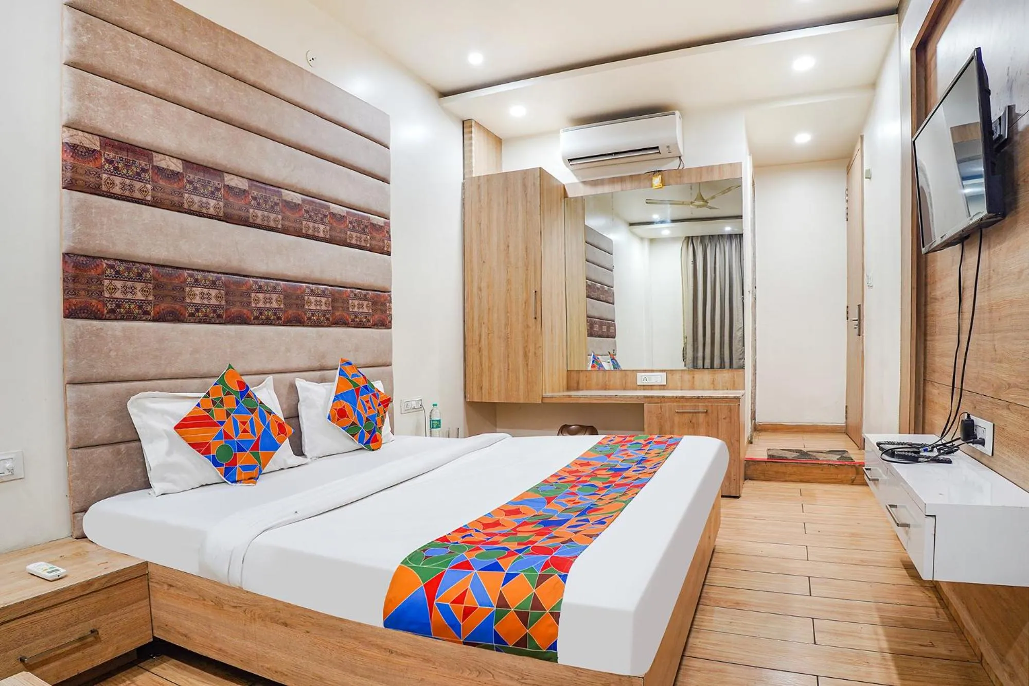 Bed in FabHotel Prime OM Palace