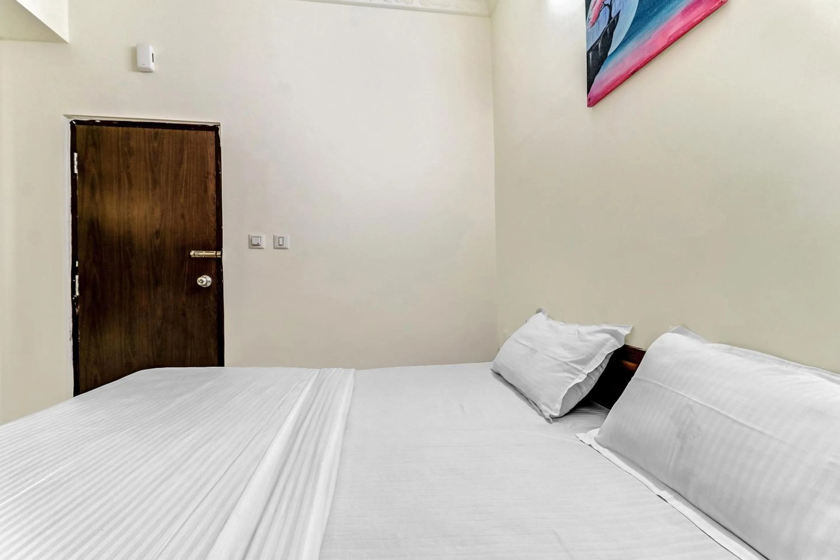 Bedroom, Bed in Capital O Safari Rooms Near Snow City