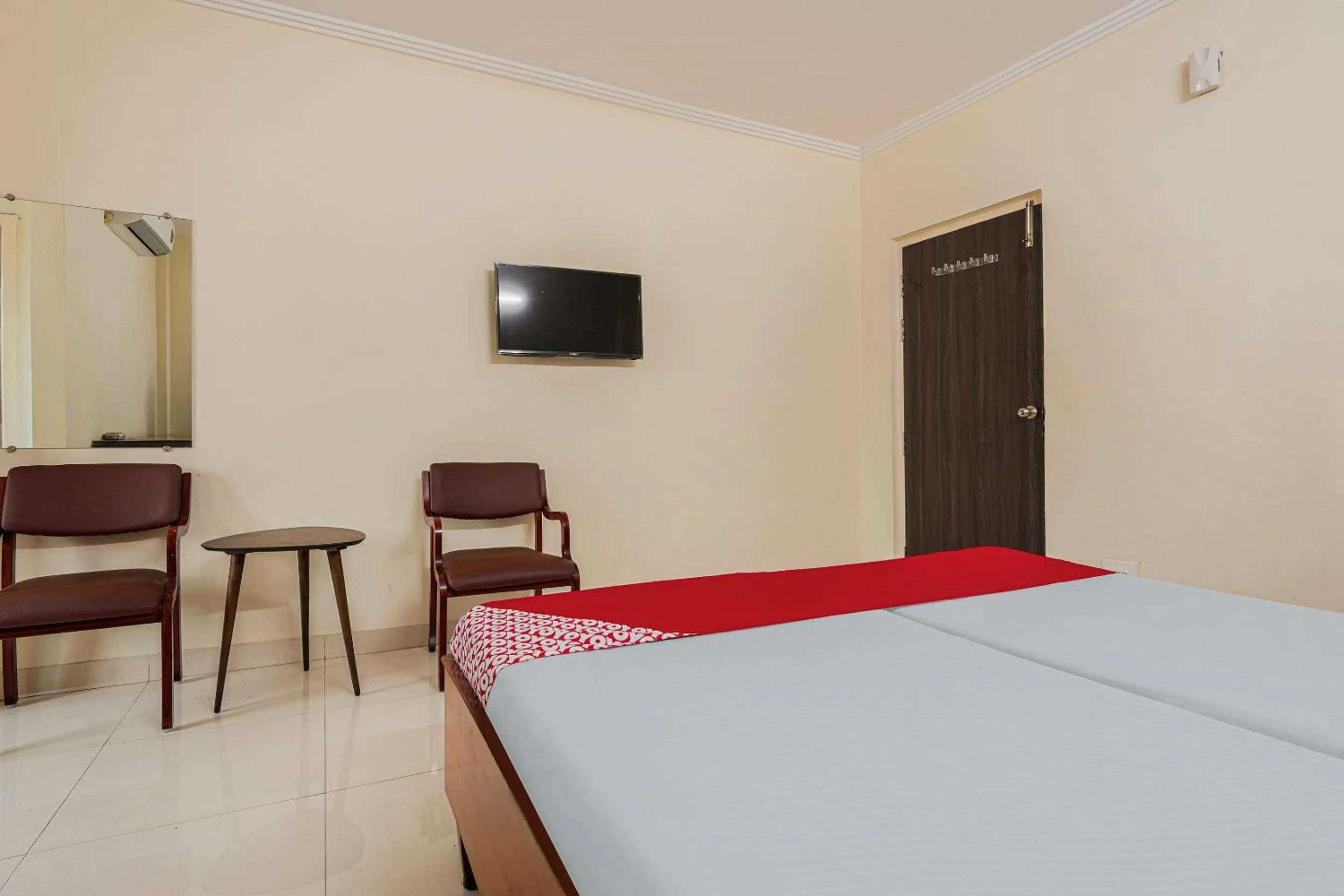 Bedroom, Bed in Hotel O SRIDEVI GRAND