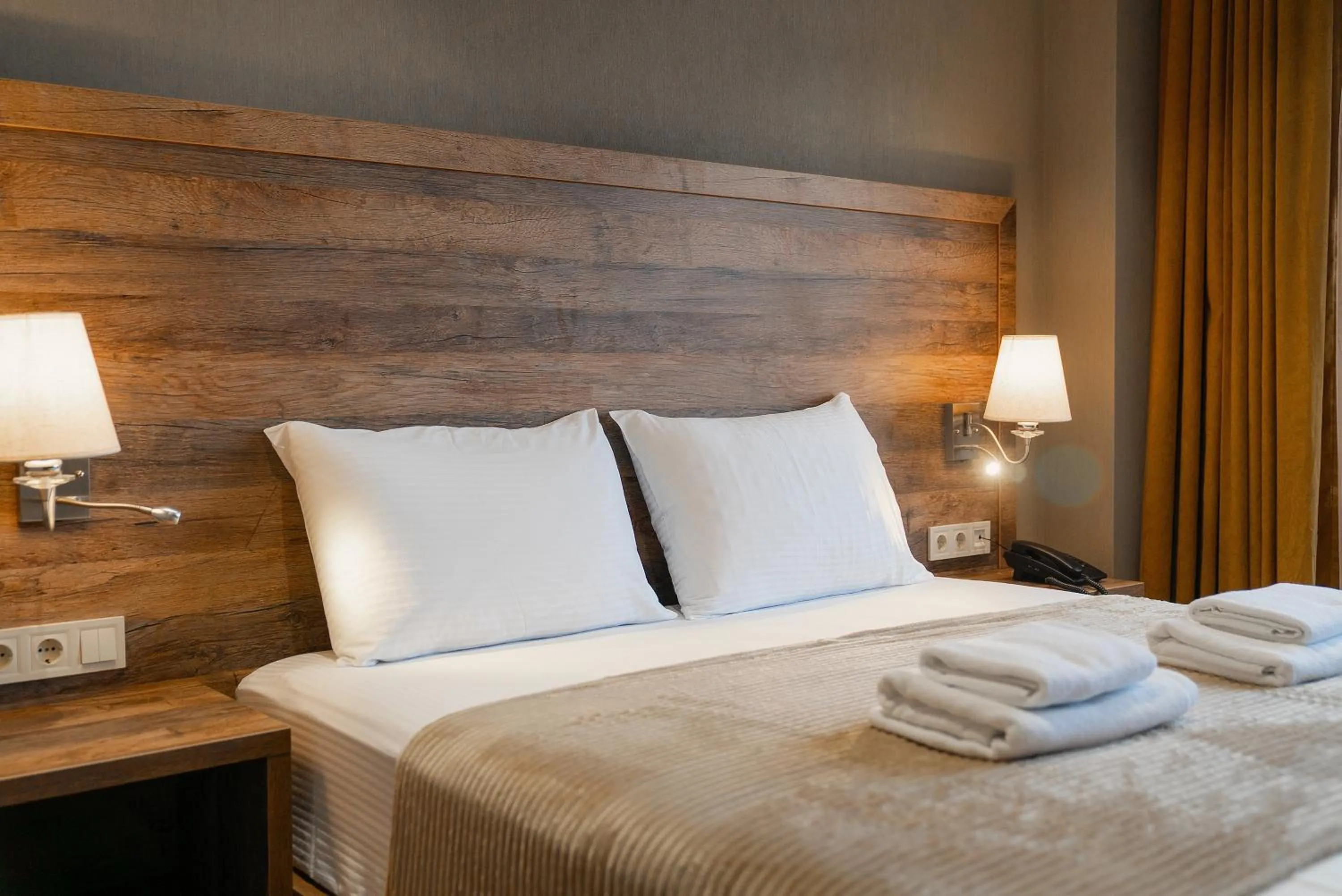 Bed in Cozy Loft Hotel