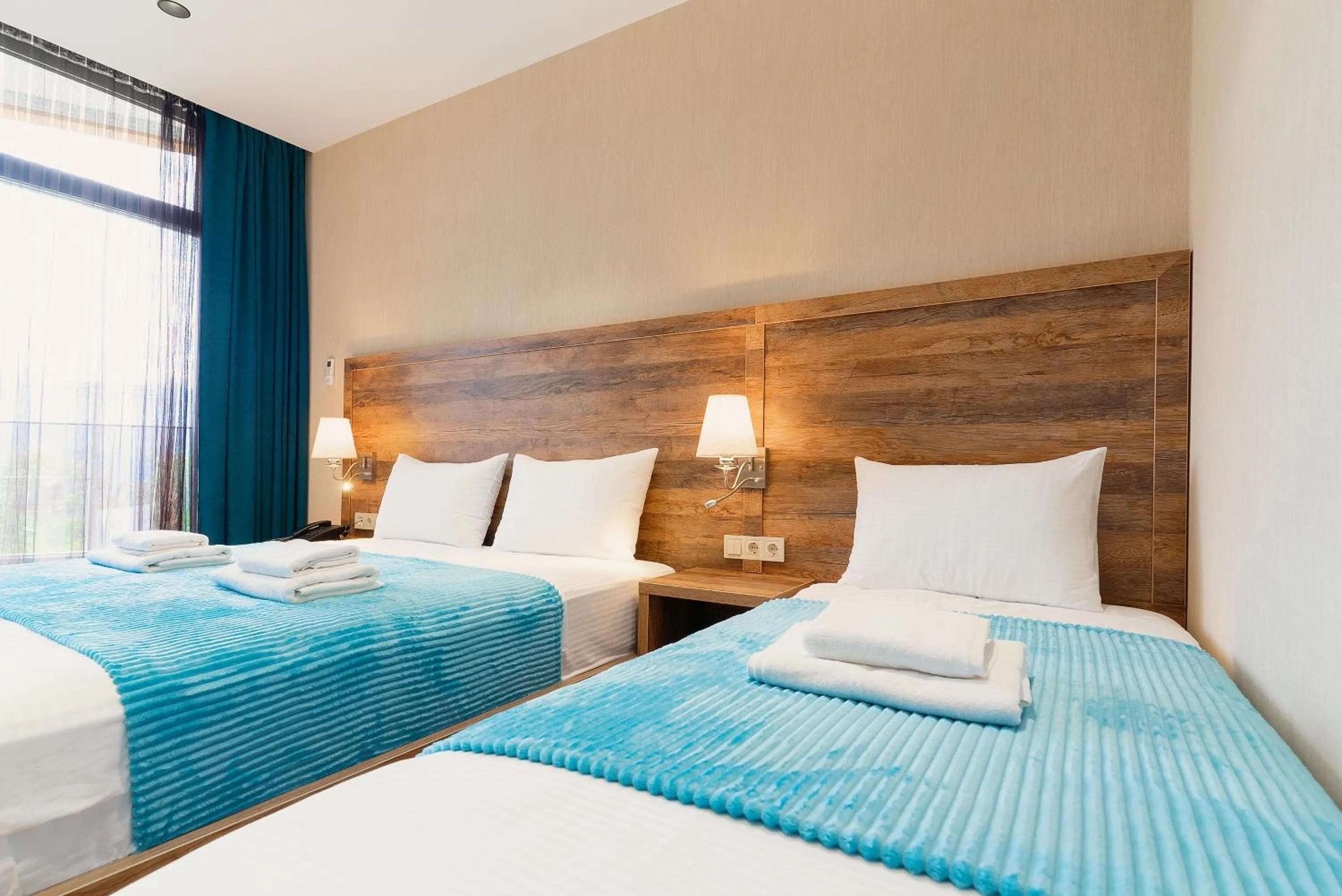 Bed in Cozy Loft Hotel