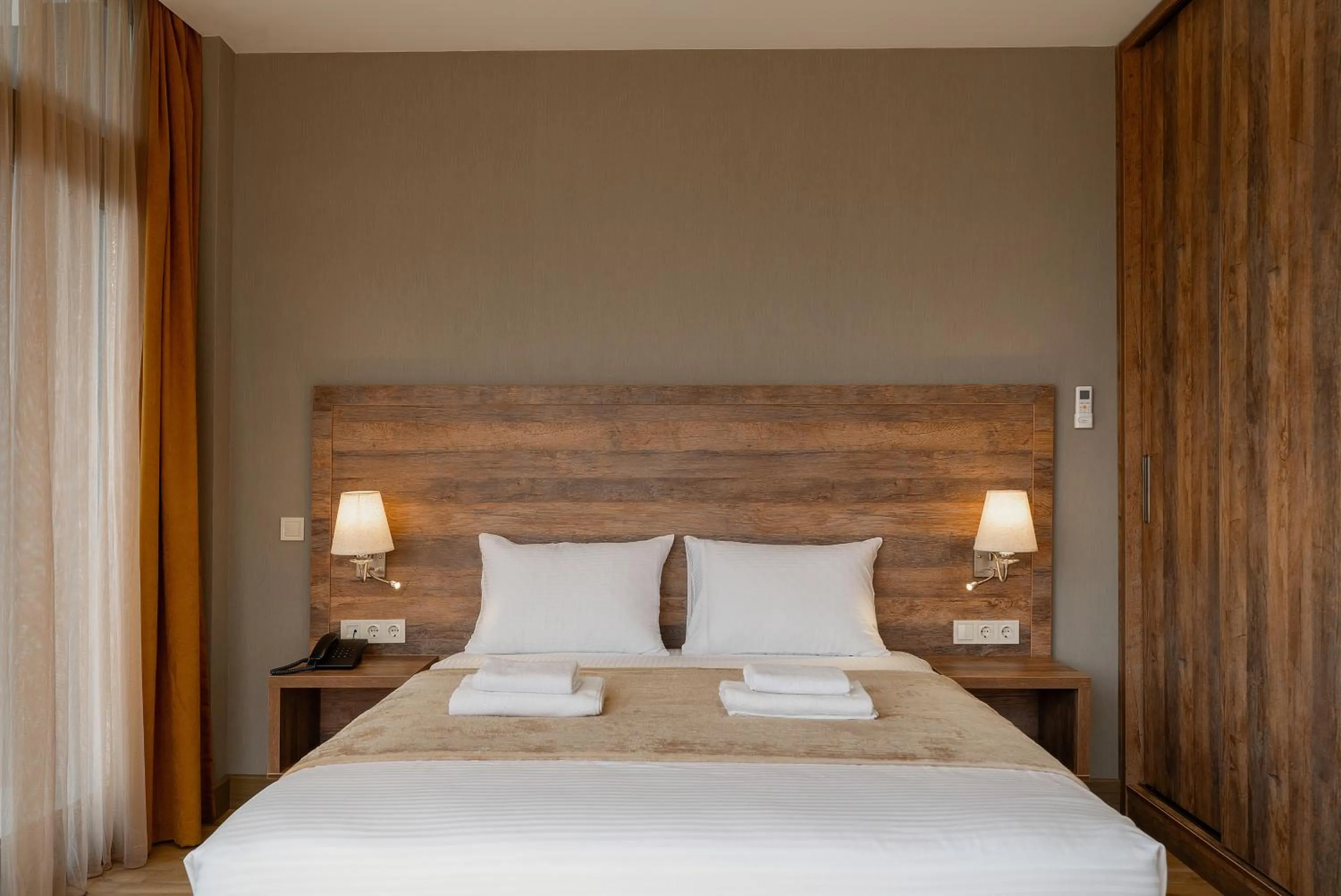 Bed in Cozy Loft Hotel