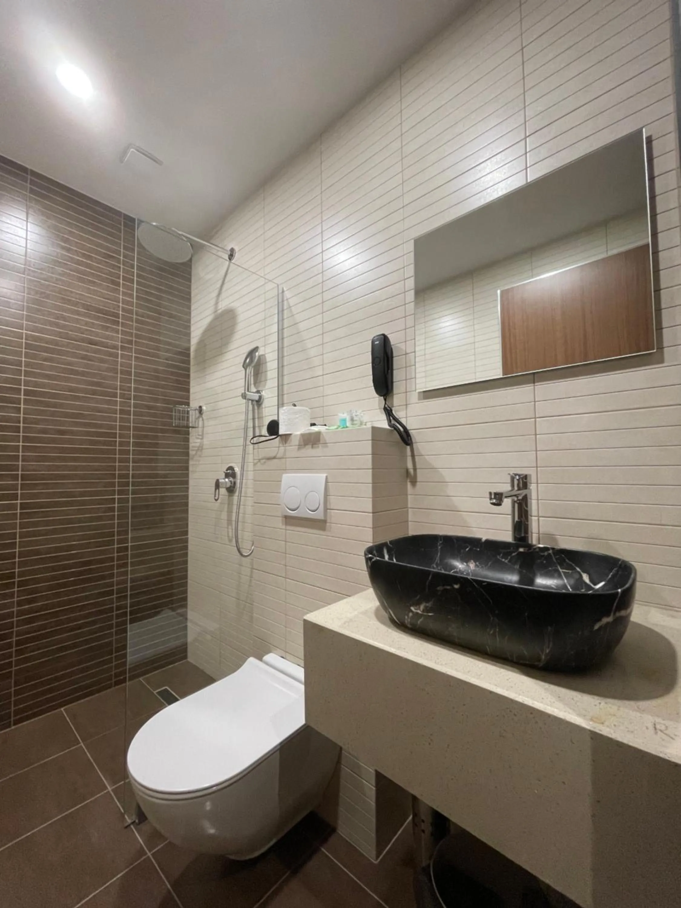 Bathroom in Cozy Loft Hotel