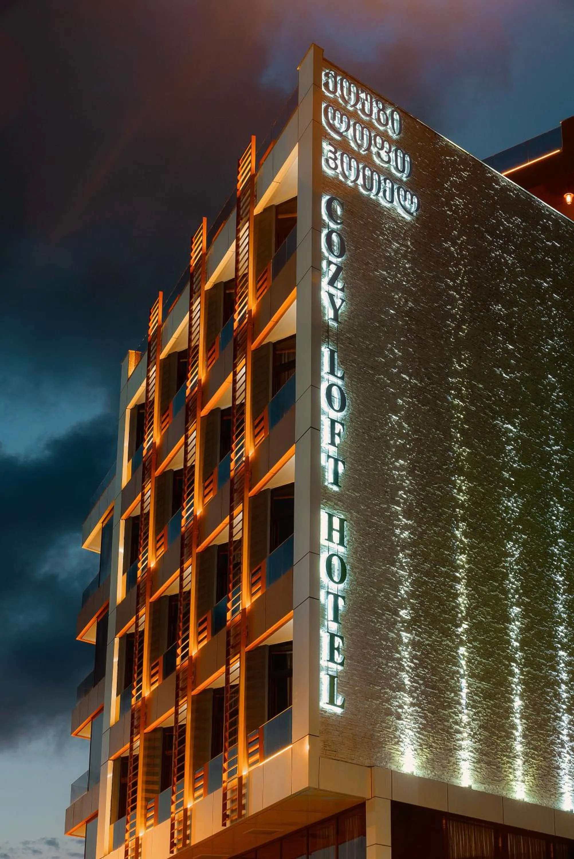 Property building in Cozy Loft Hotel