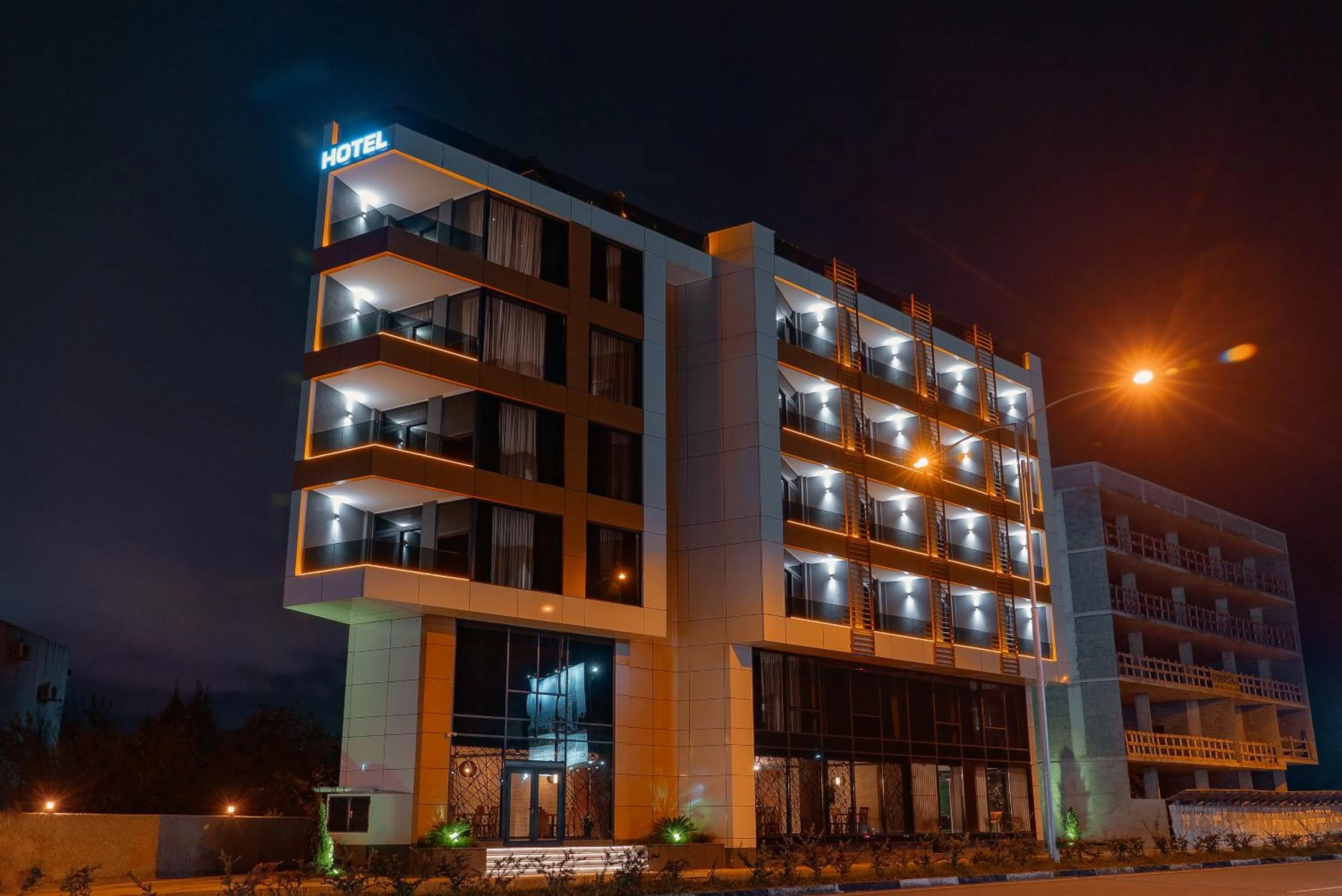 Property building in Cozy Loft Hotel