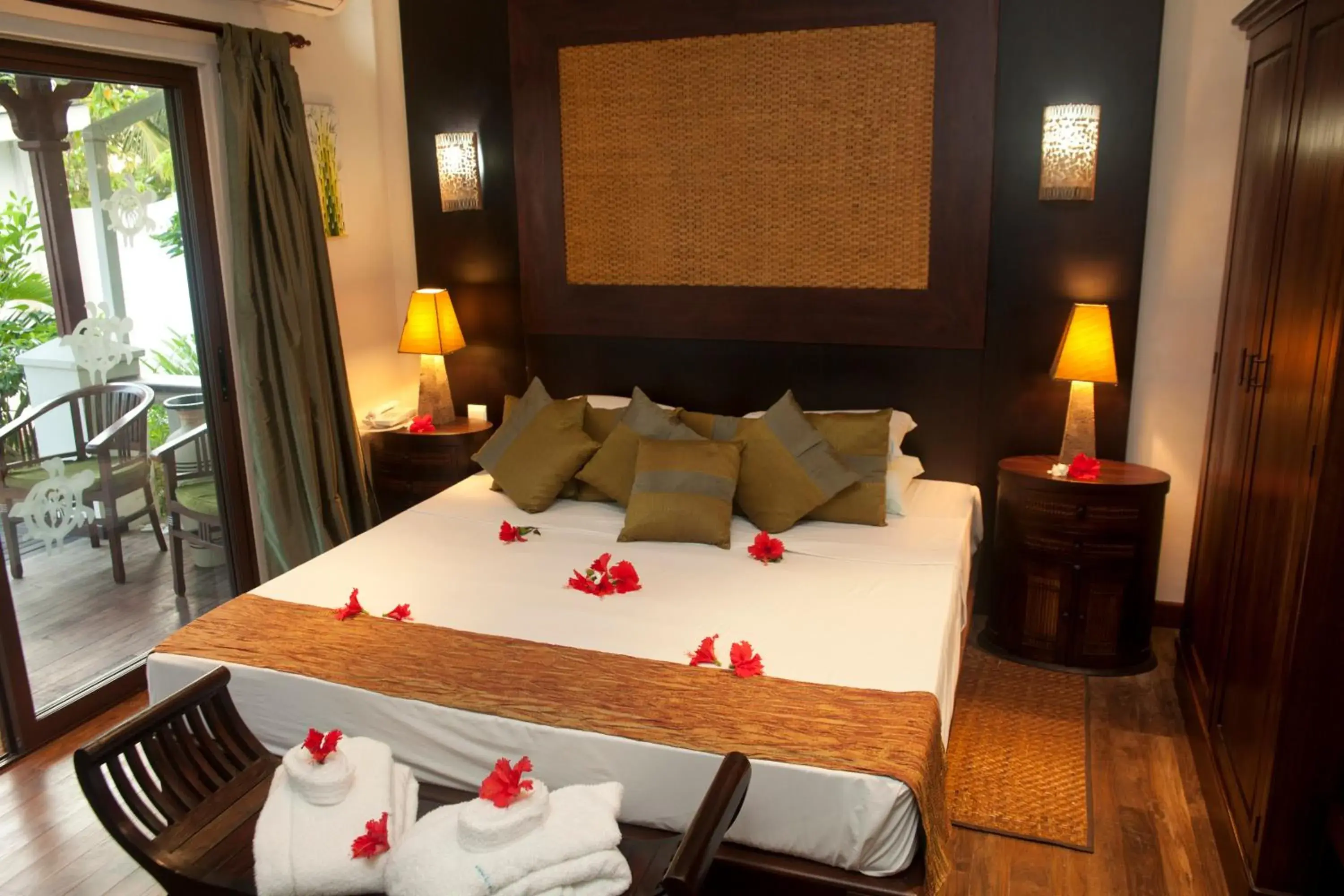 Bed in Le Relax Beach Resort Bed in Le Relax Beach Resort