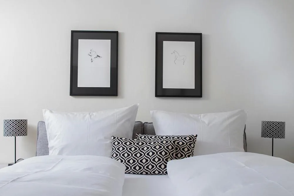 Bed in Alpenhof Garnihotel & Ferienwohnungen