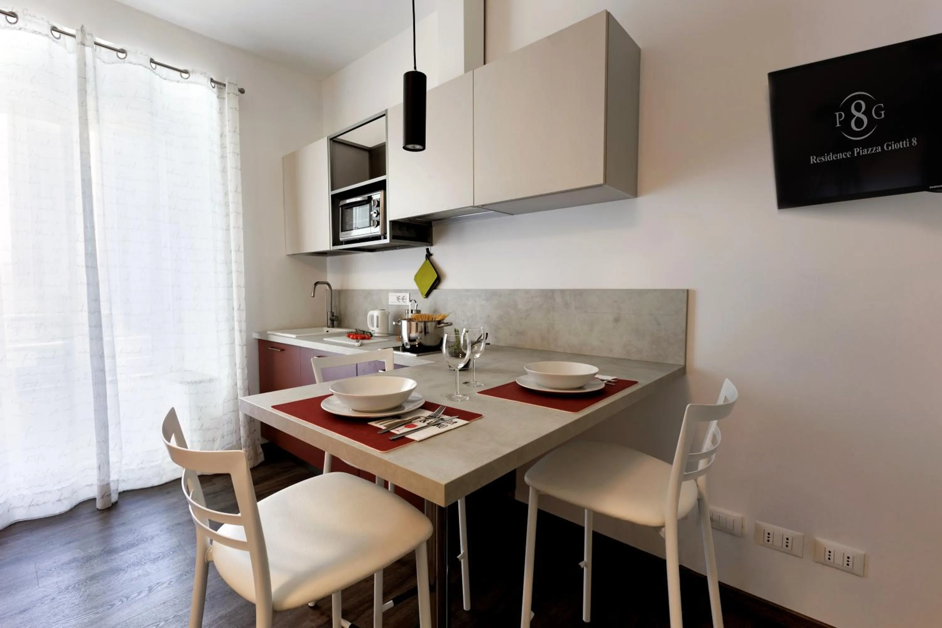 Dining area in Residence Piazza Giotti 8