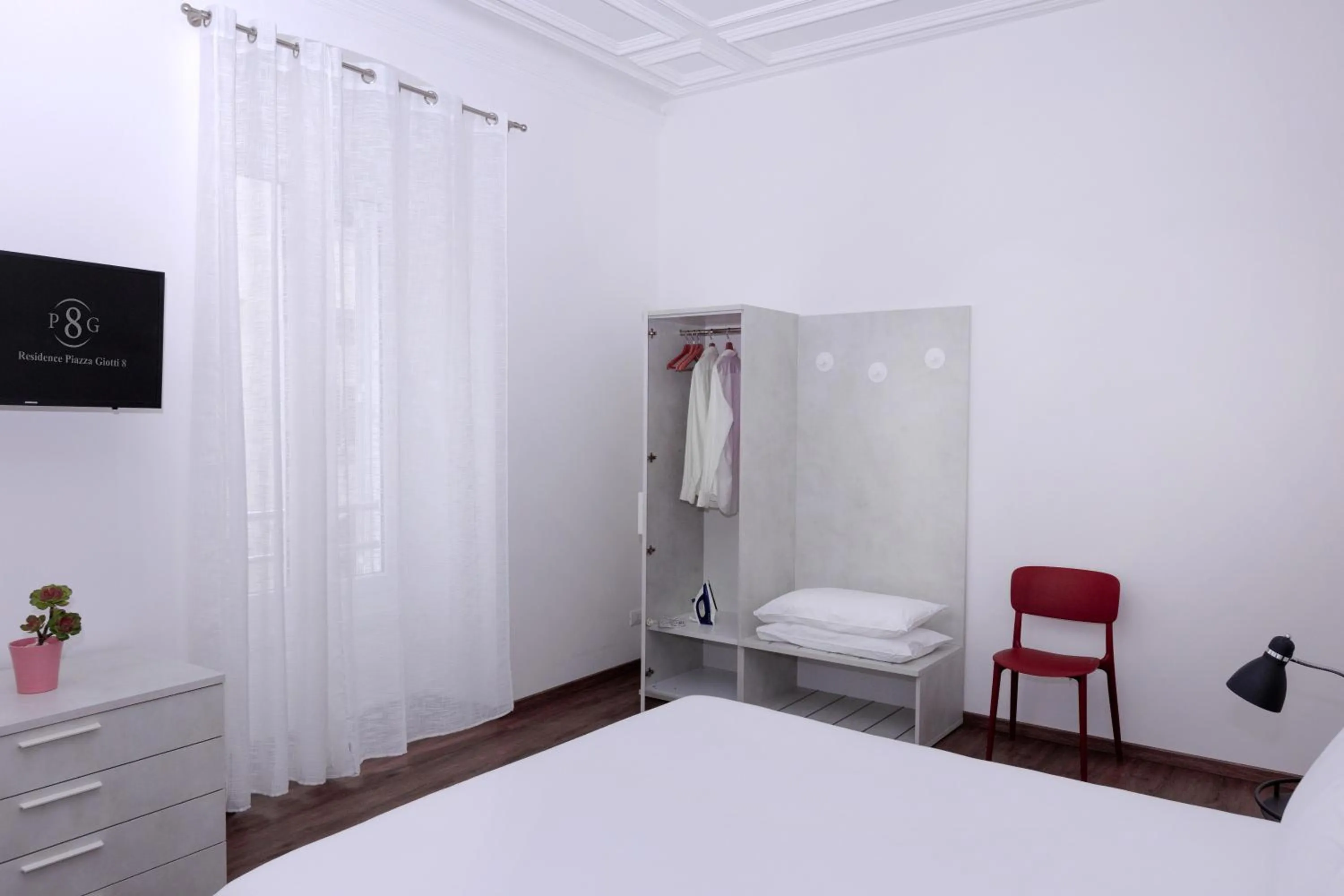 Photo of the whole room, Bed in Residence Piazza Giotti 8