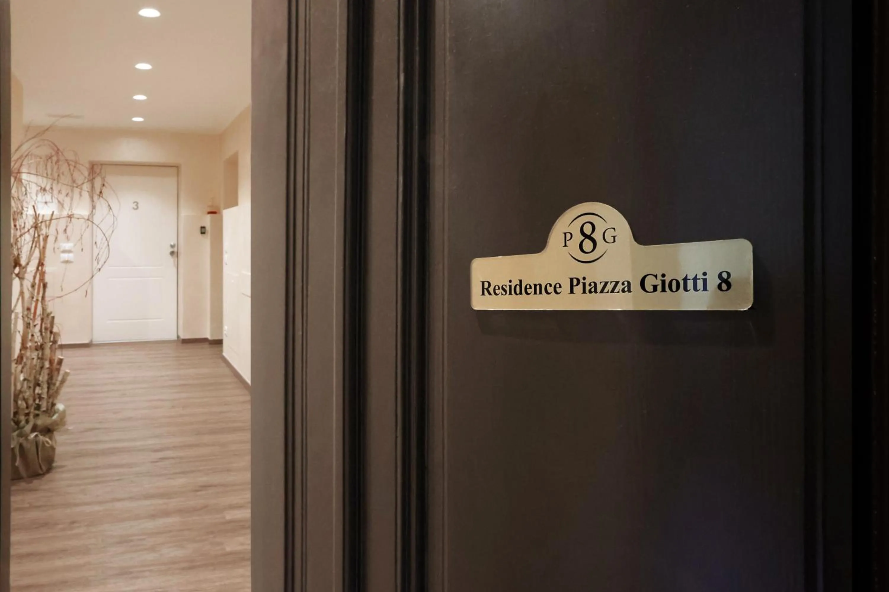 Property logo or sign in Residence Piazza Giotti 8