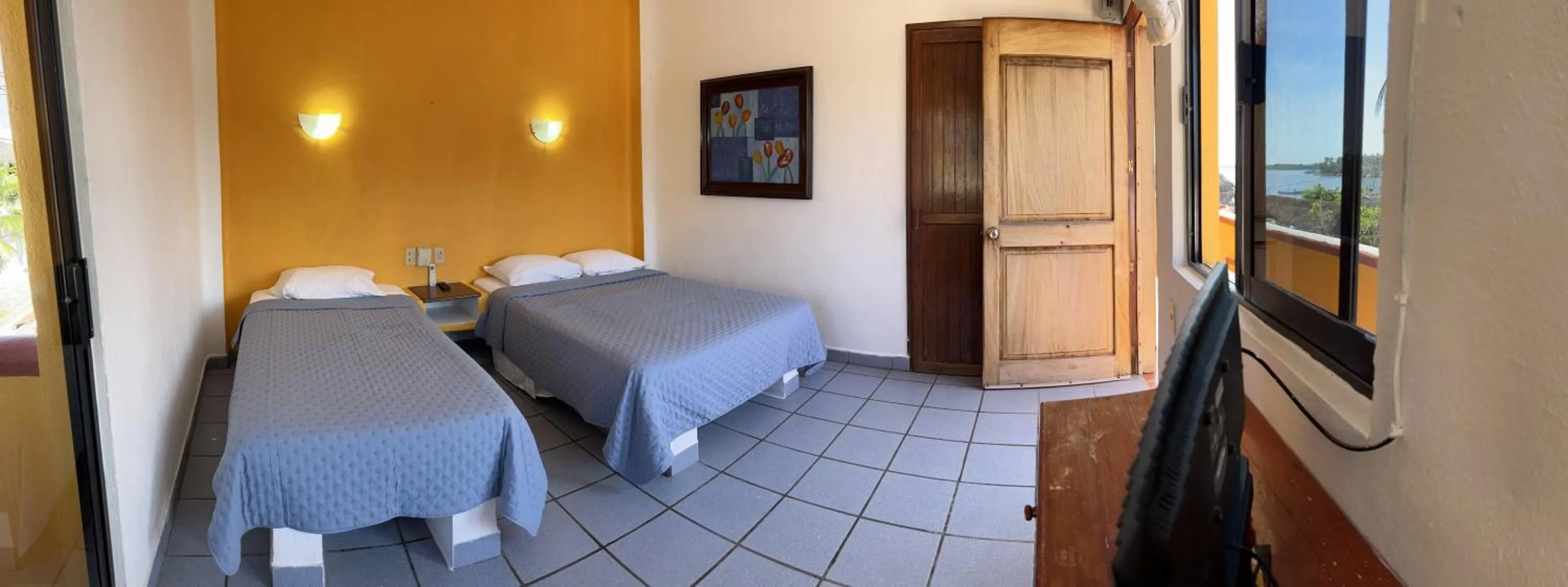 Bed in Hotel Joya Del Mar