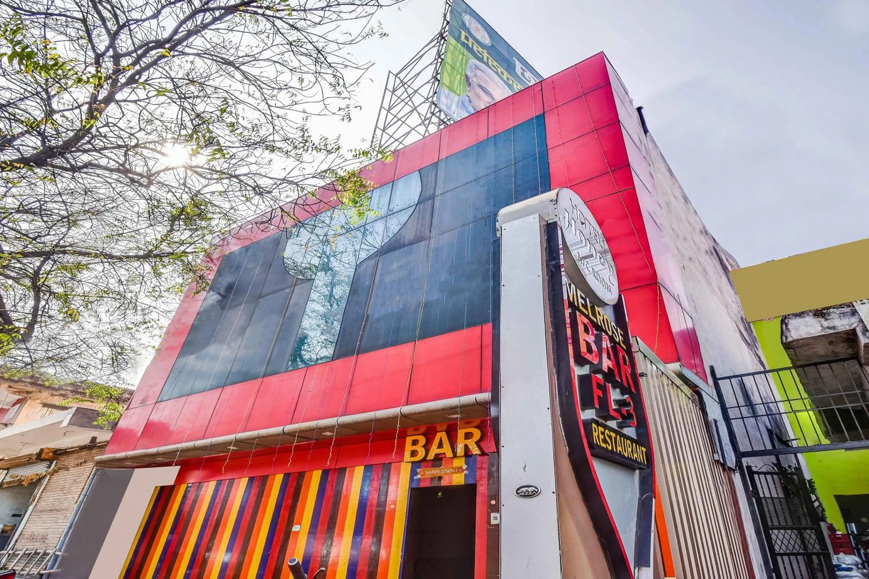 Facade/entrance in Capital O Honey Hotel