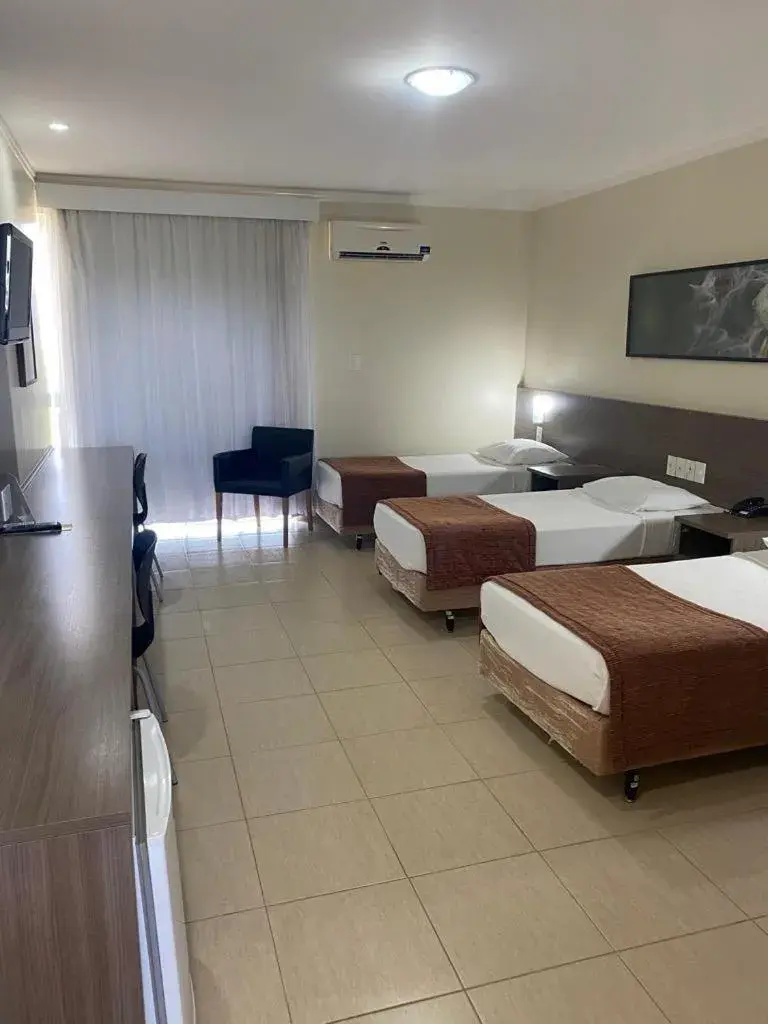 Triple Room with Balcony - single occupancy in Class Hotel Passos Rio Grande Portal da Canastra Triple Room with Balcony - single occupancy in Class Hotel Passos Rio Grande Portal da Canastra
