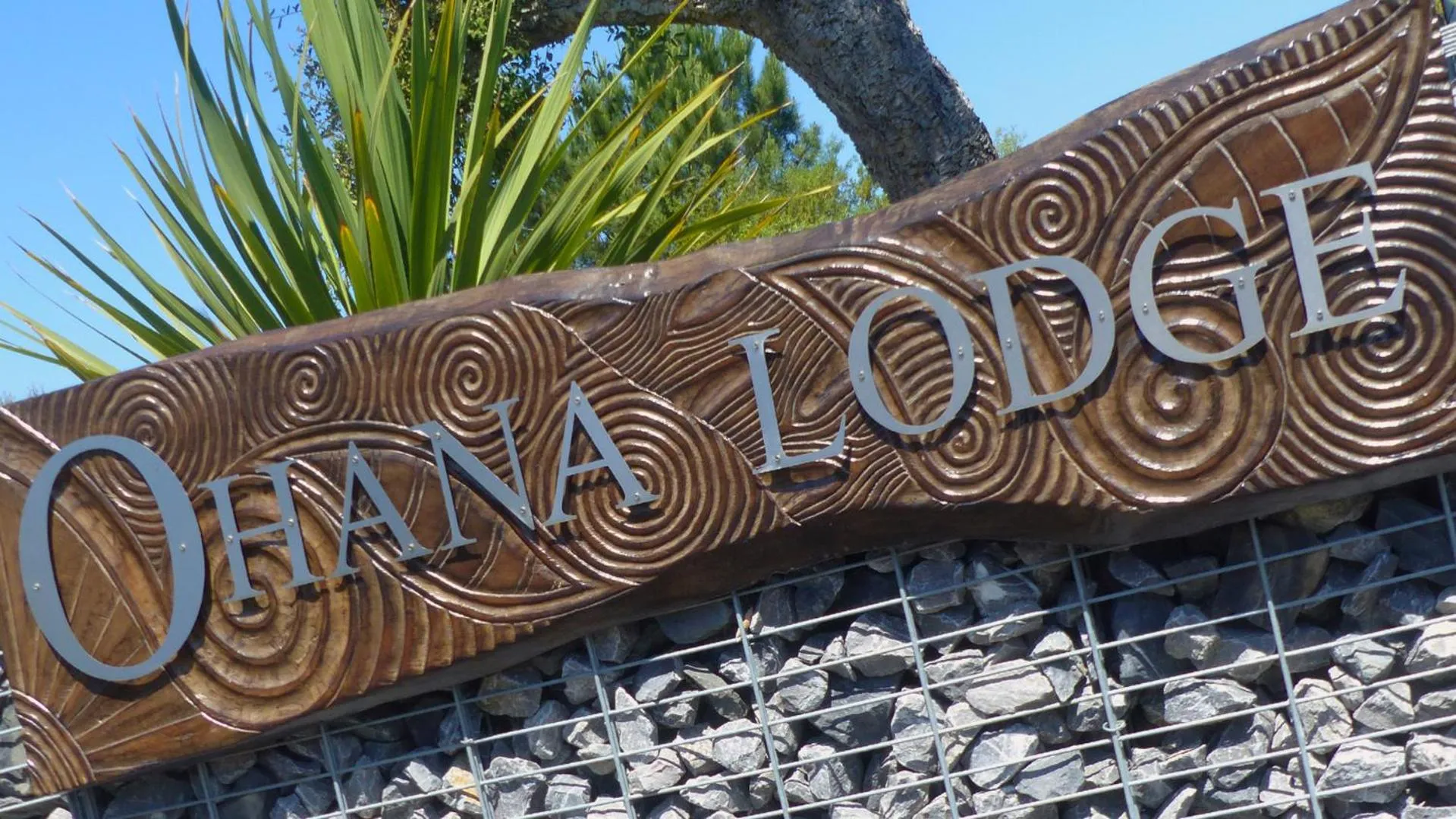 Property logo or sign in Ohana Lodge