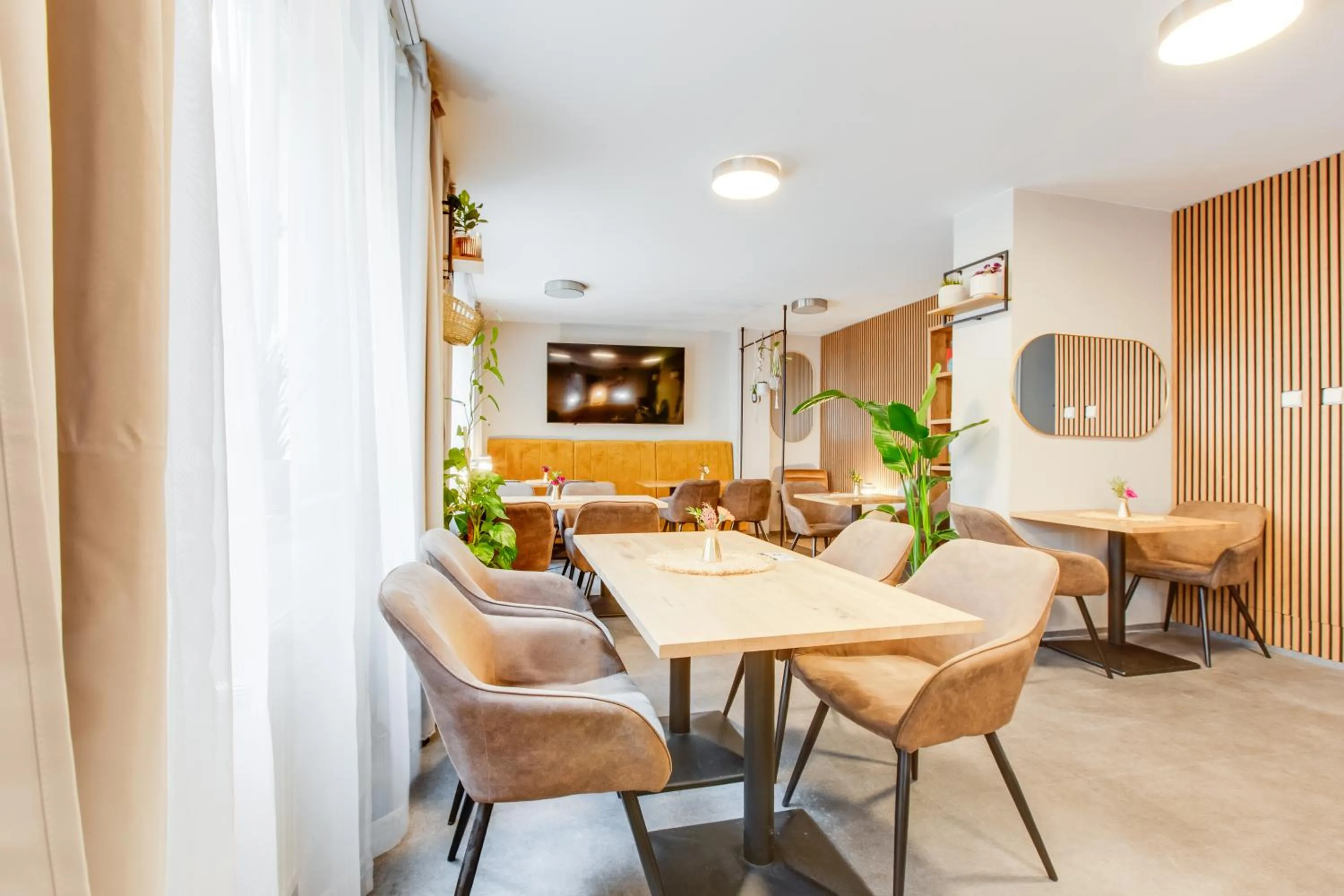 Communal lounge/ TV room in Hotel Andante