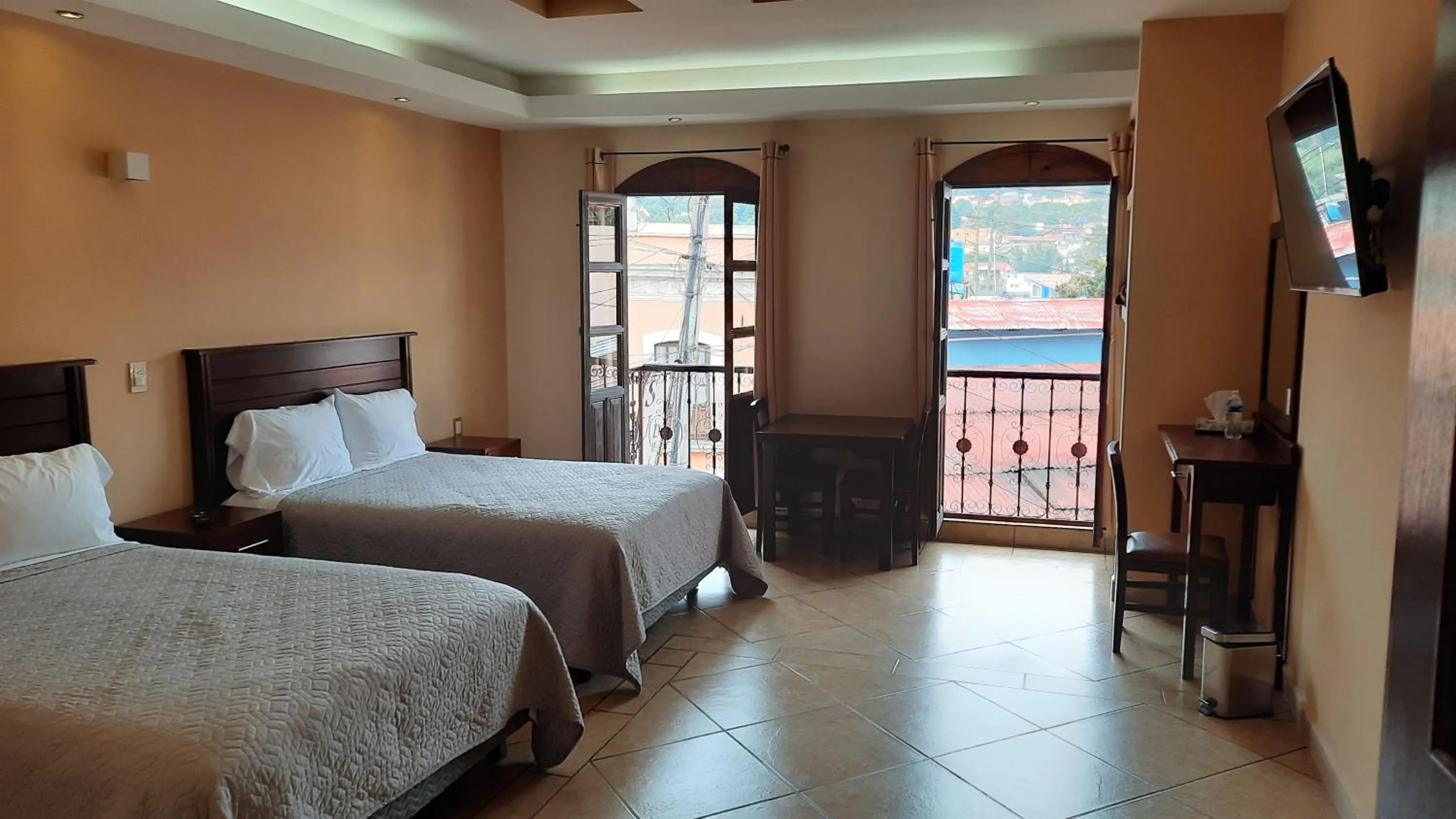 Photo of the whole room, Bed in Suites Del Risco