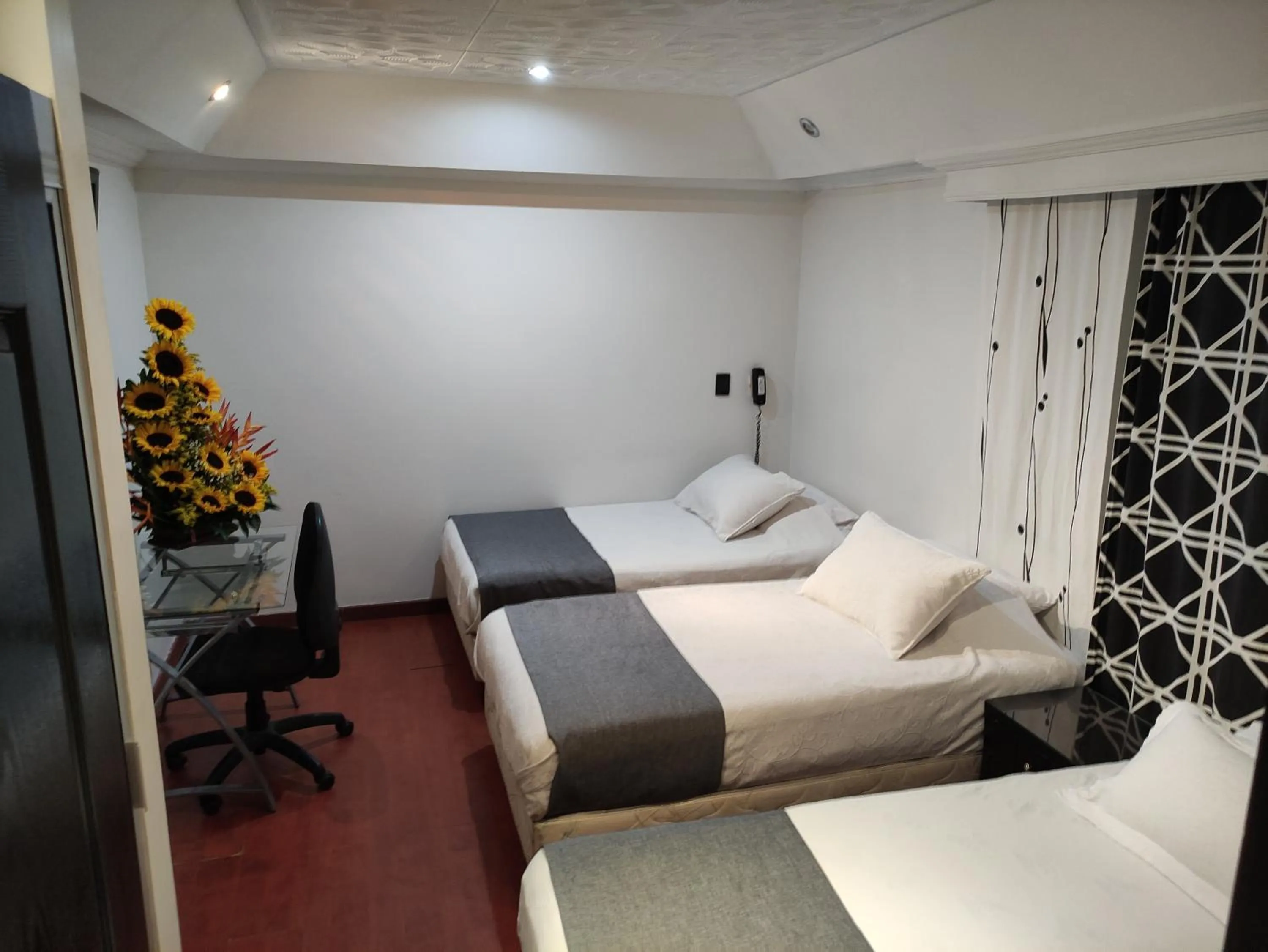 Bed in Hotel Ejecutivo Embajada