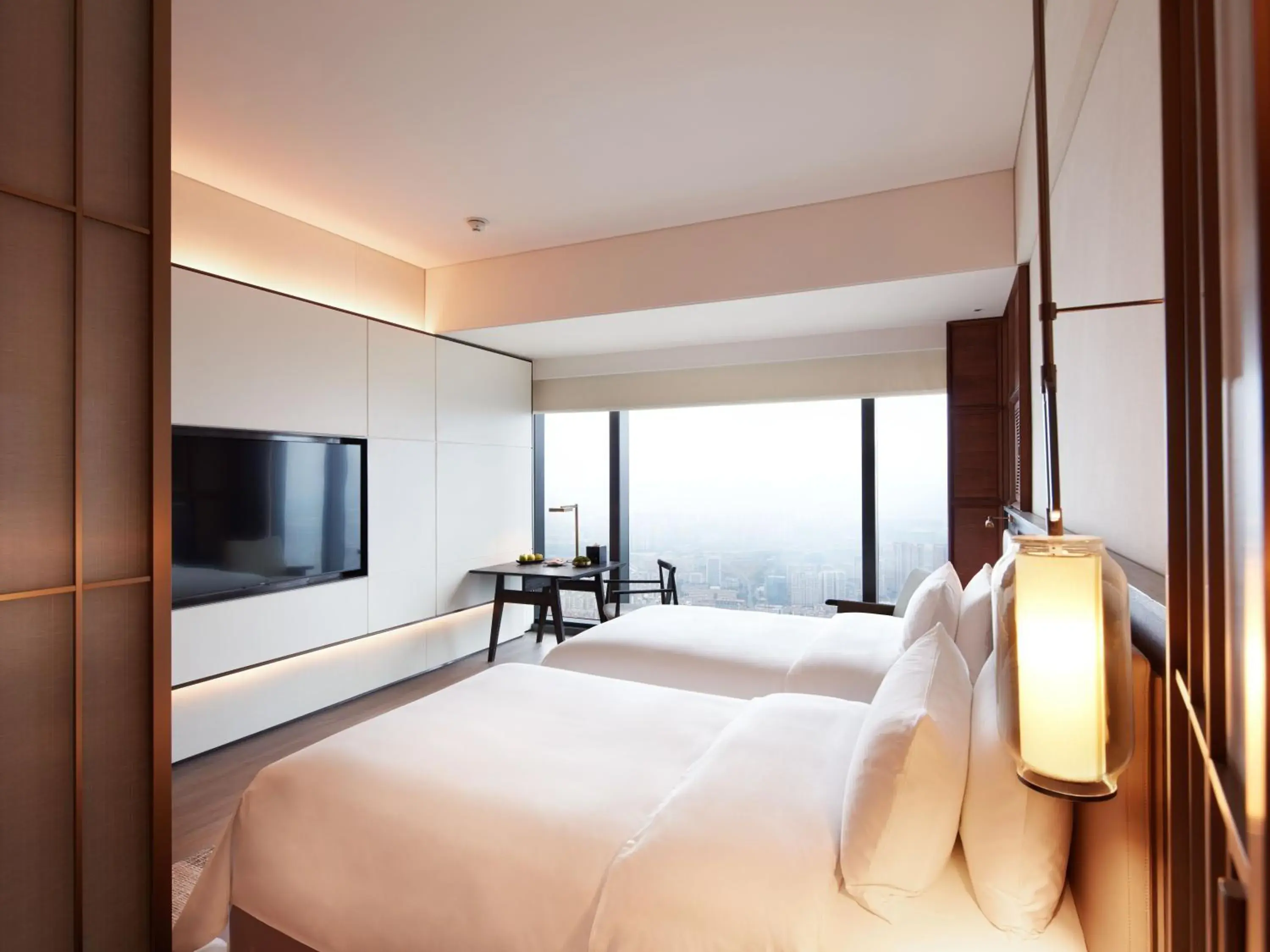 Photo of the whole room, Bed in Shangri-La Nanning - The tallest hotel worldwide in Shangri-La Group Photo of the whole room, Bed in Shangri-La Nanning - The tallest hotel worldwide in Shangri-La Group