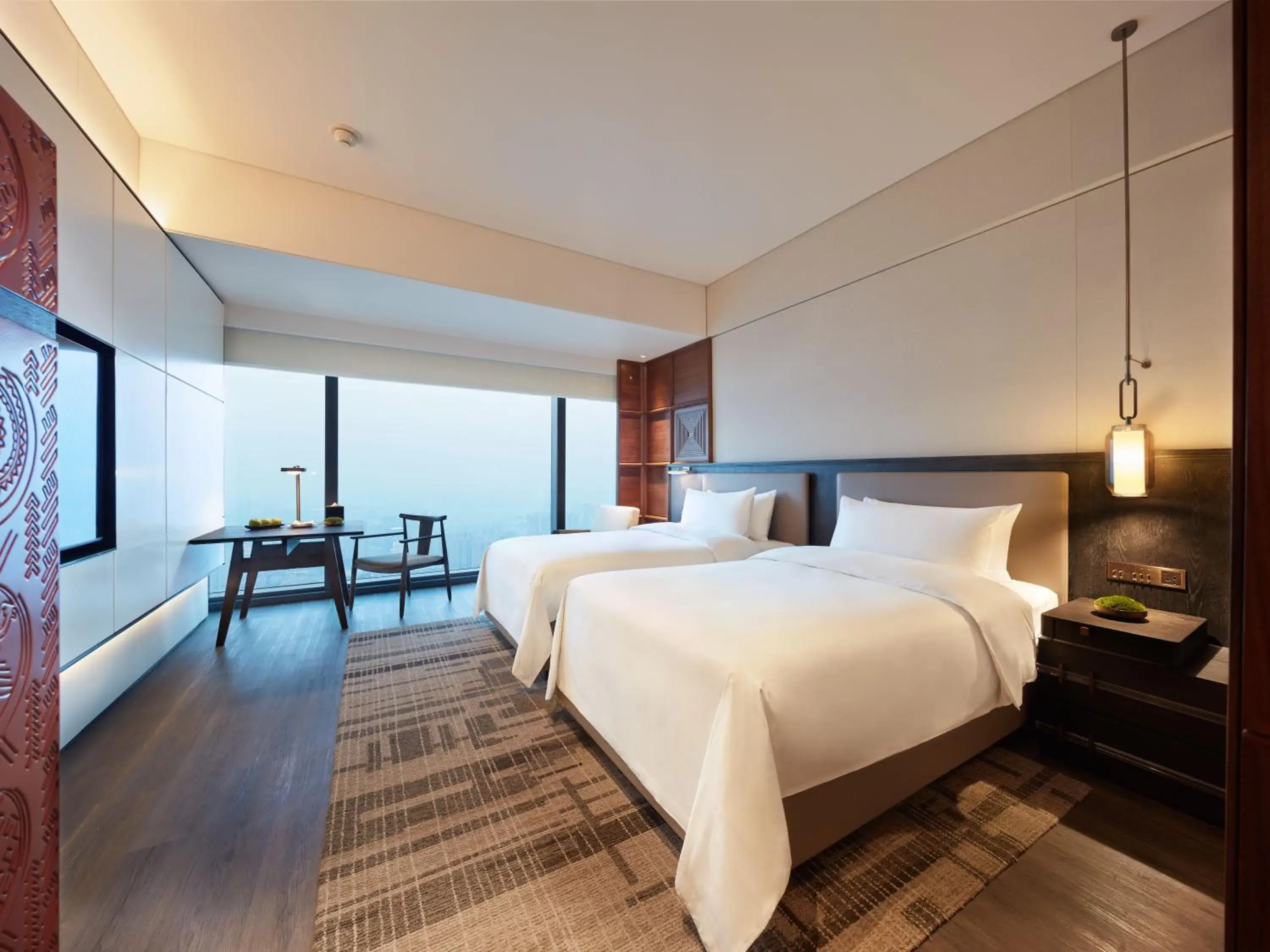 Photo of the whole room, Bed in Shangri-La Nanning - The tallest hotel worldwide in Shangri-La Group Photo of the whole room, Bed in Shangri-La Nanning - The tallest hotel worldwide in Shangri-La Group