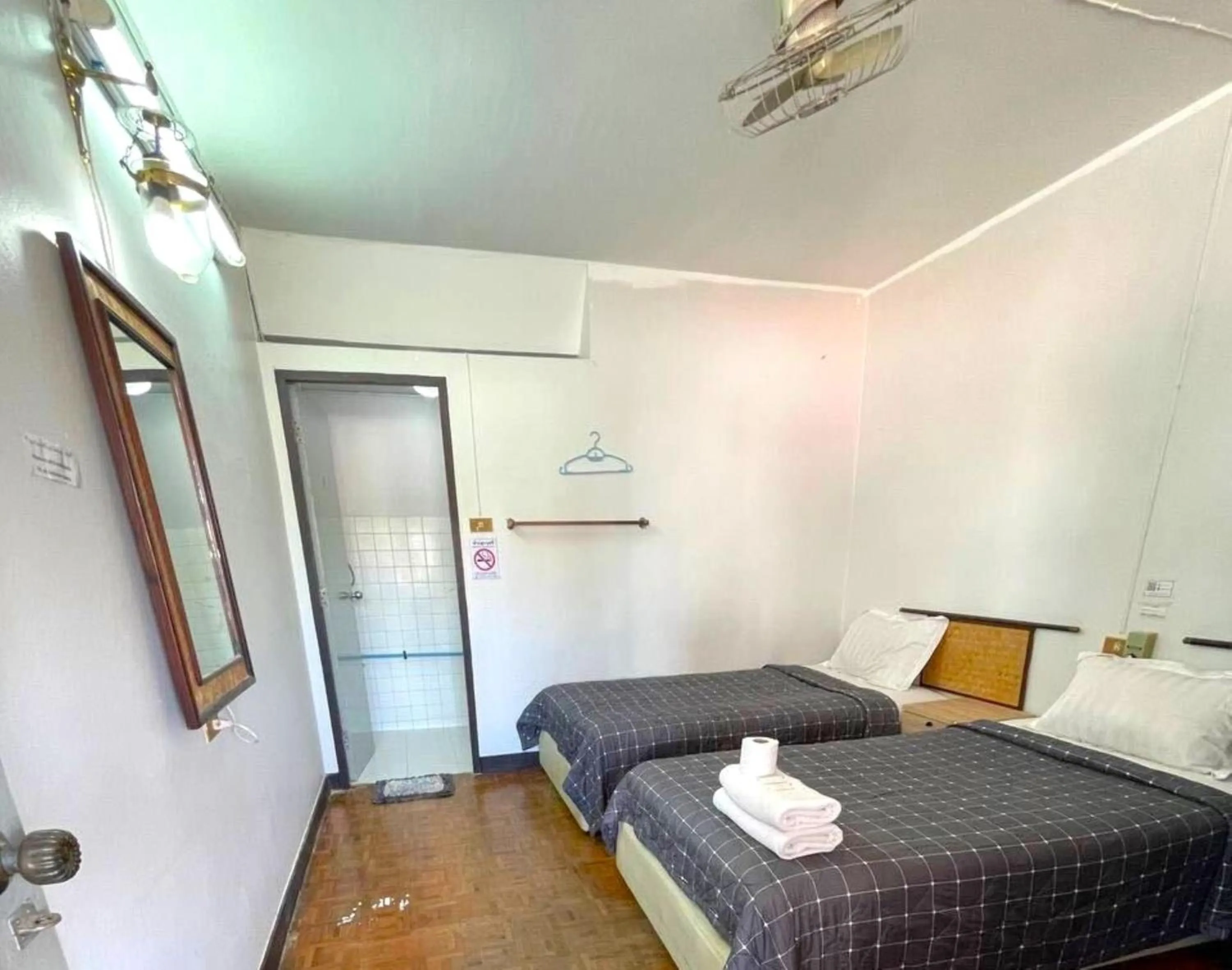 Bed in Chomdoi House Hotel