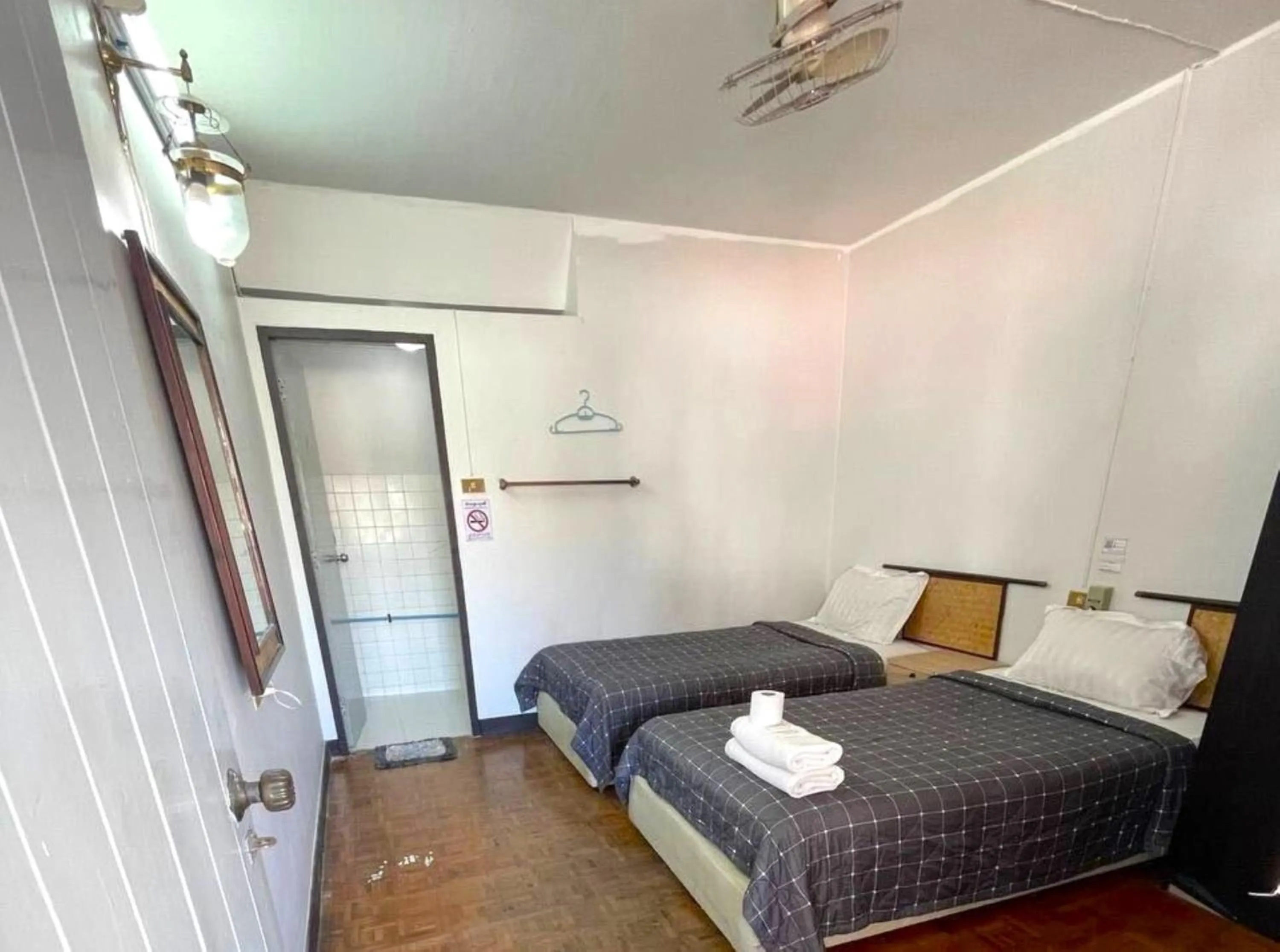 Bed in Chomdoi House Hotel