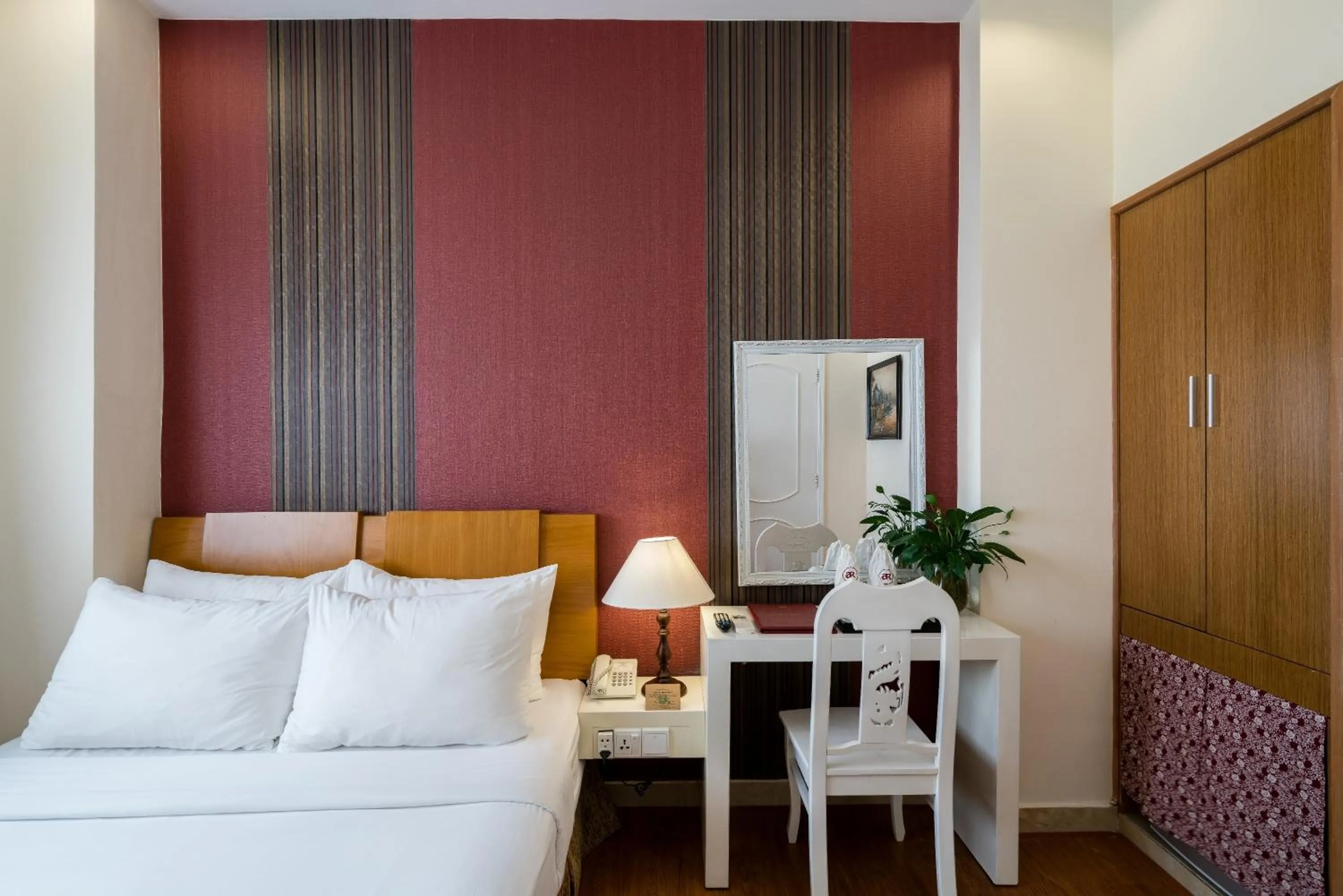 Bed in Asian Ruby Center Point Hotel & Spa