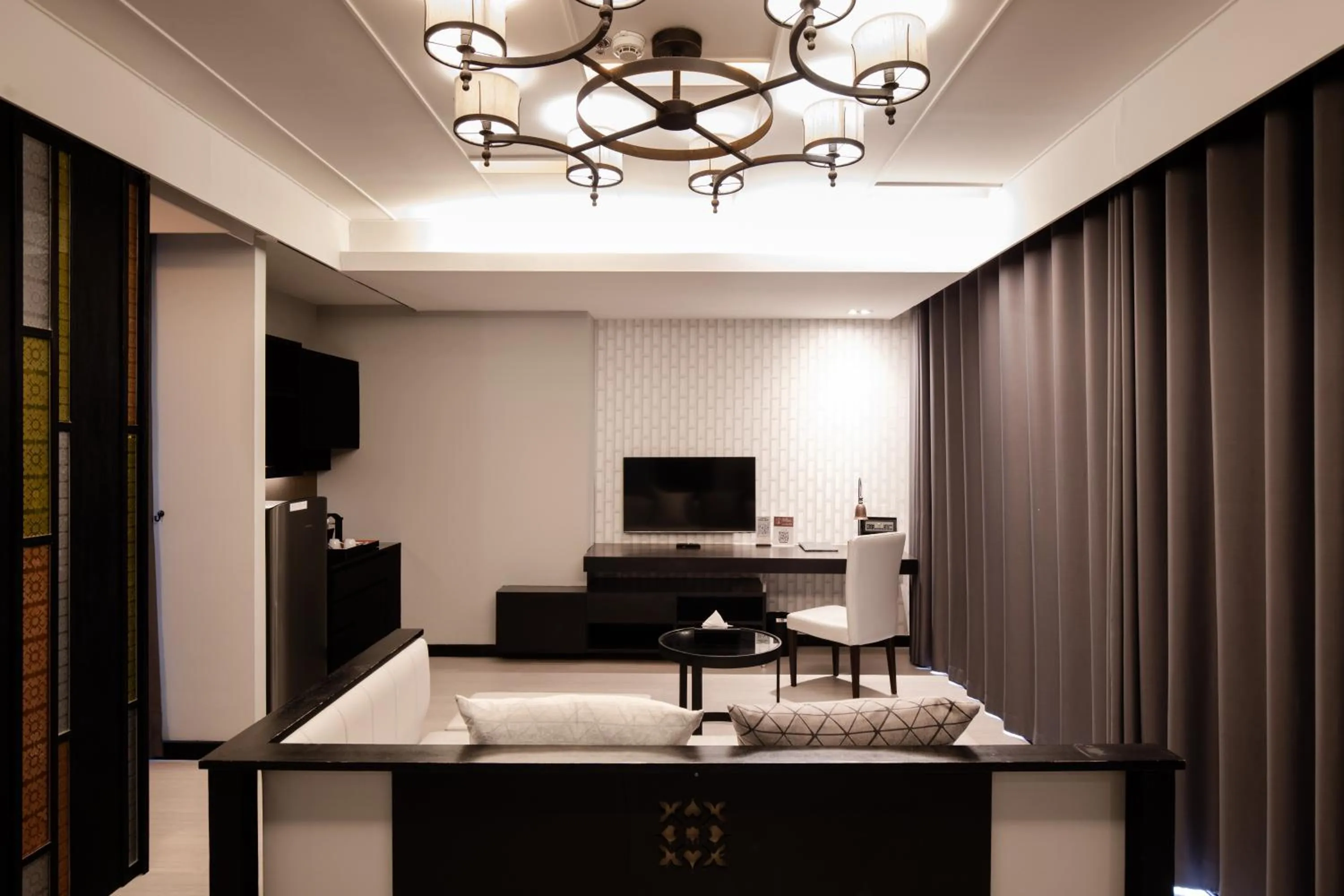 Living room in De Chai Oriental Nimman - SHA Plus