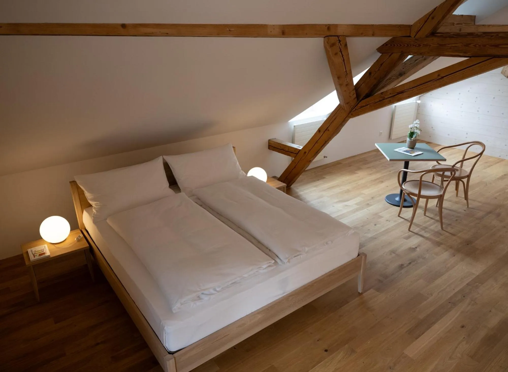 Photo of the whole room, Bed in FLÜHLI Hotel Kurhaus