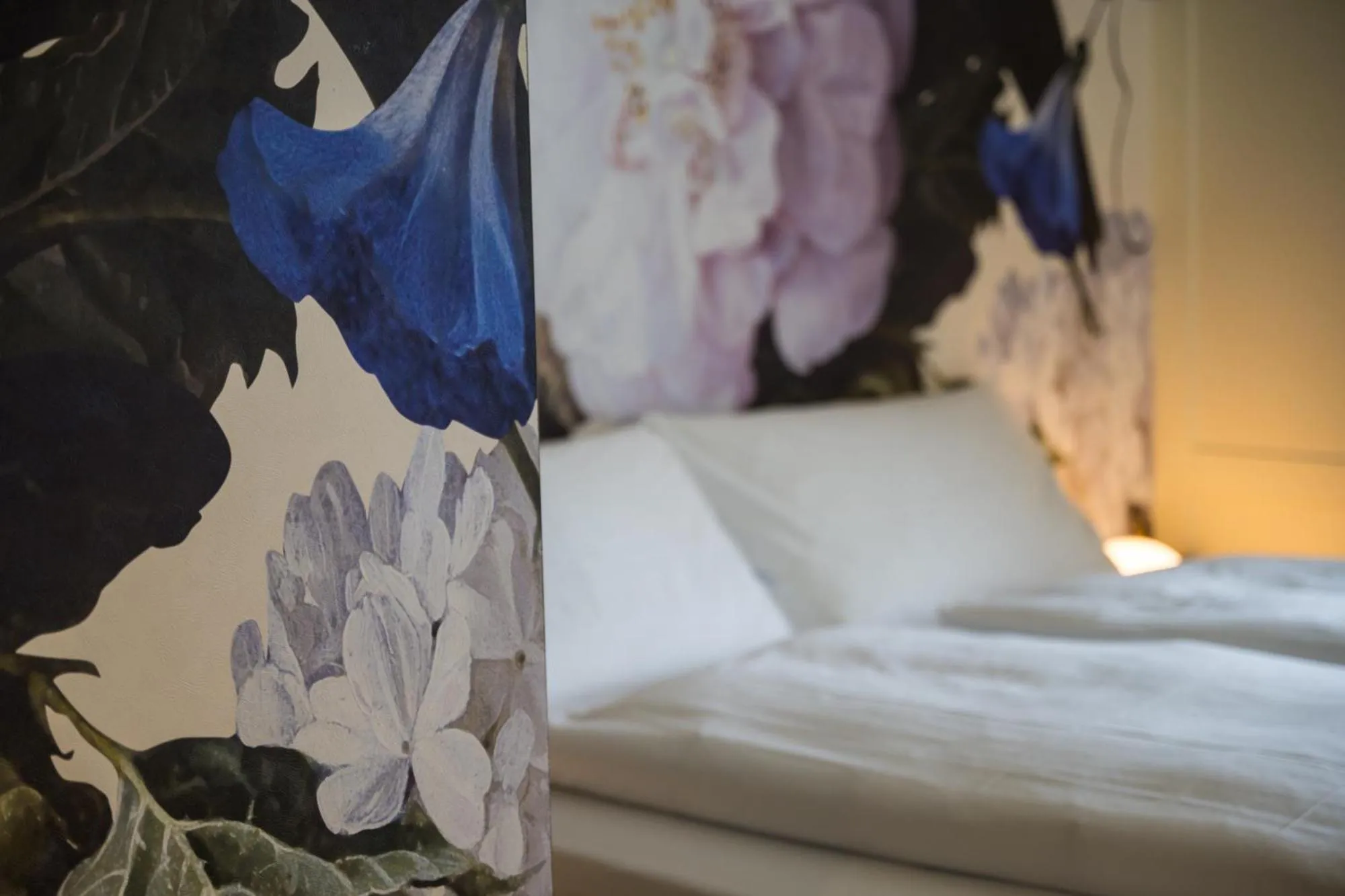 Photo of the whole room, Bed in FLÜHLI Hotel Kurhaus