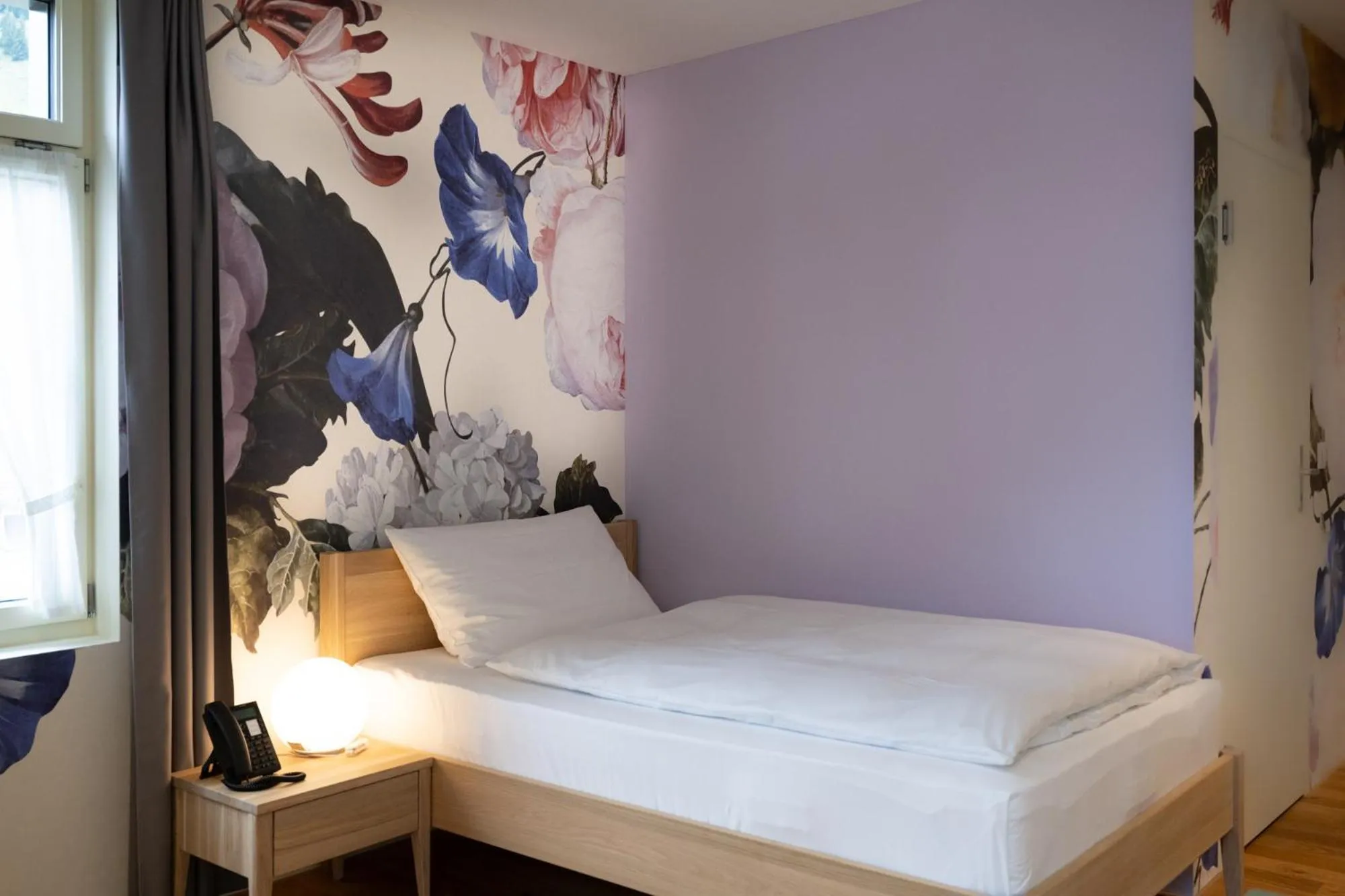 Bed in FLÜHLI Hotel Kurhaus