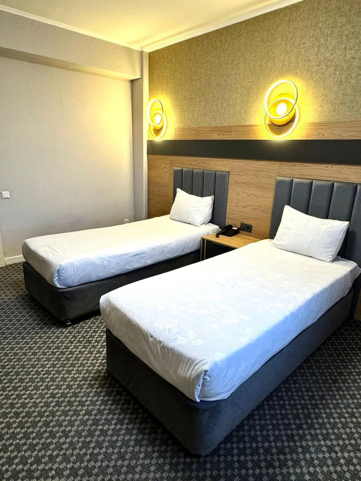 Bed in Golden Palace Hotel