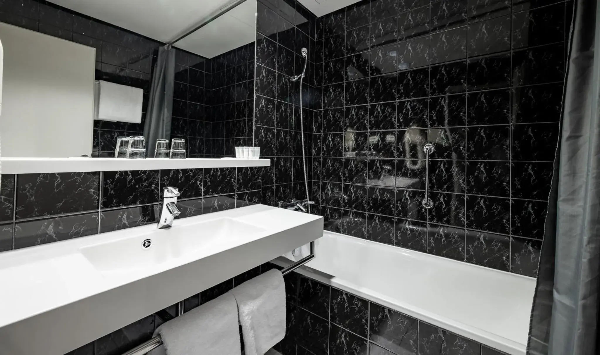 Bathroom in Expo Hotel