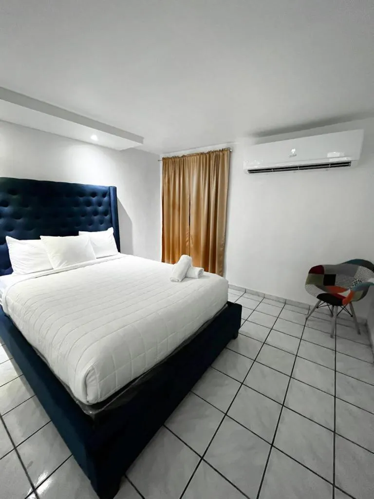 Bed in Douglas Highway Inn Hotel