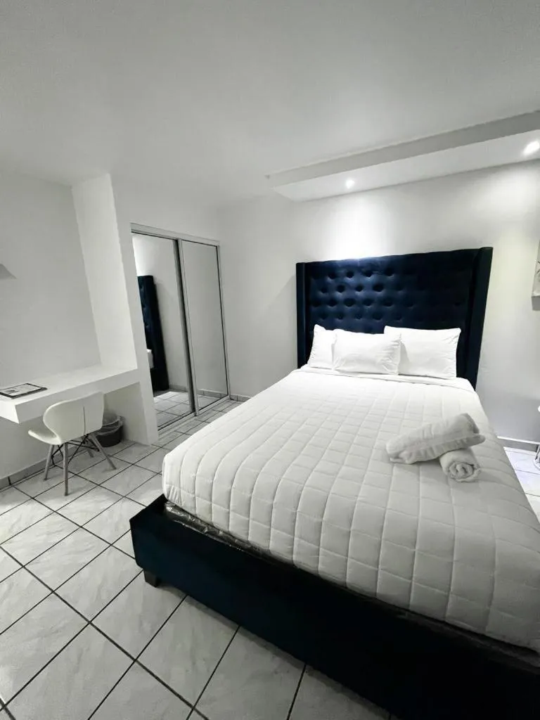 Bed in Douglas Highway Inn Hotel