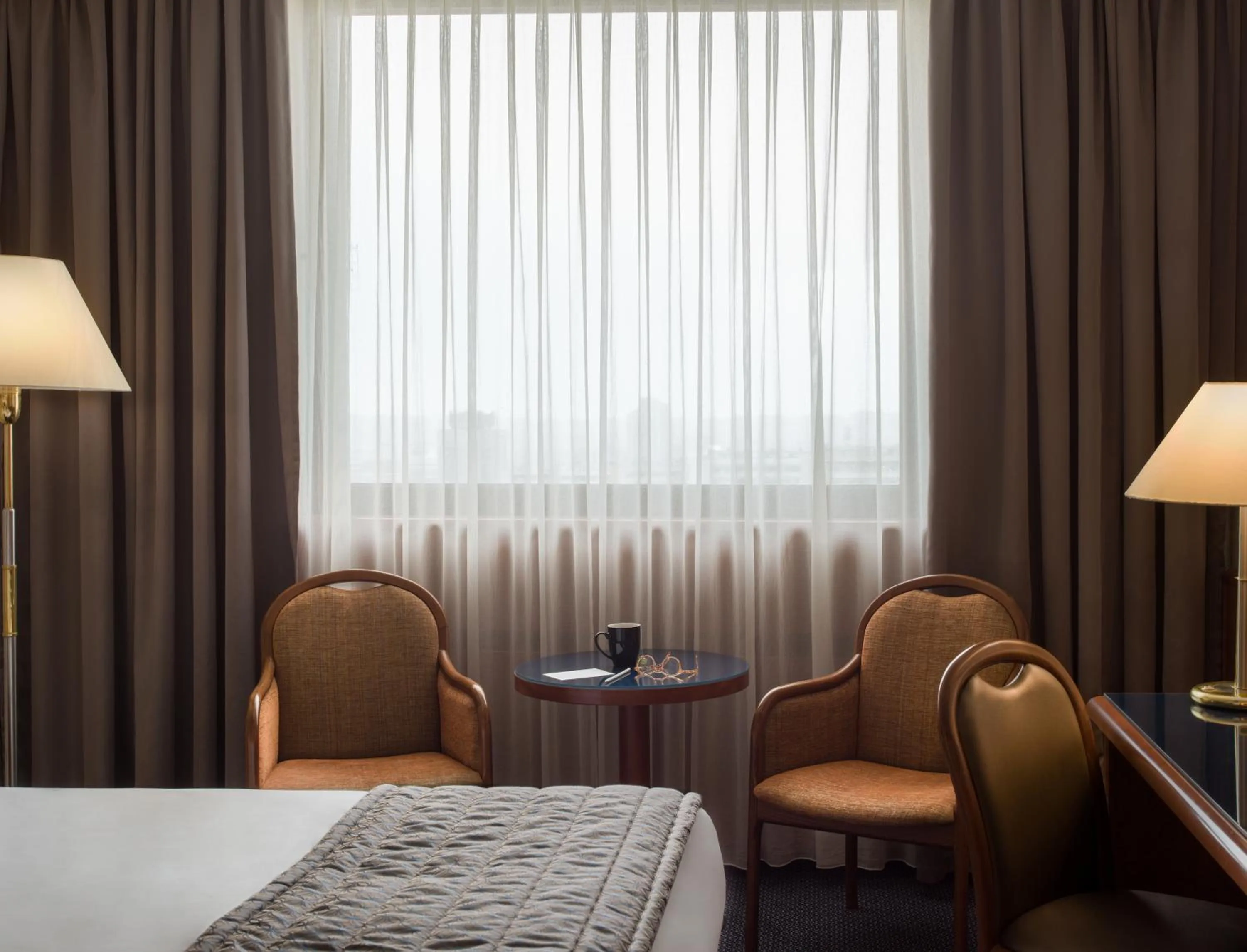 Seating area, Bed in Panorama by Verdi Hotels