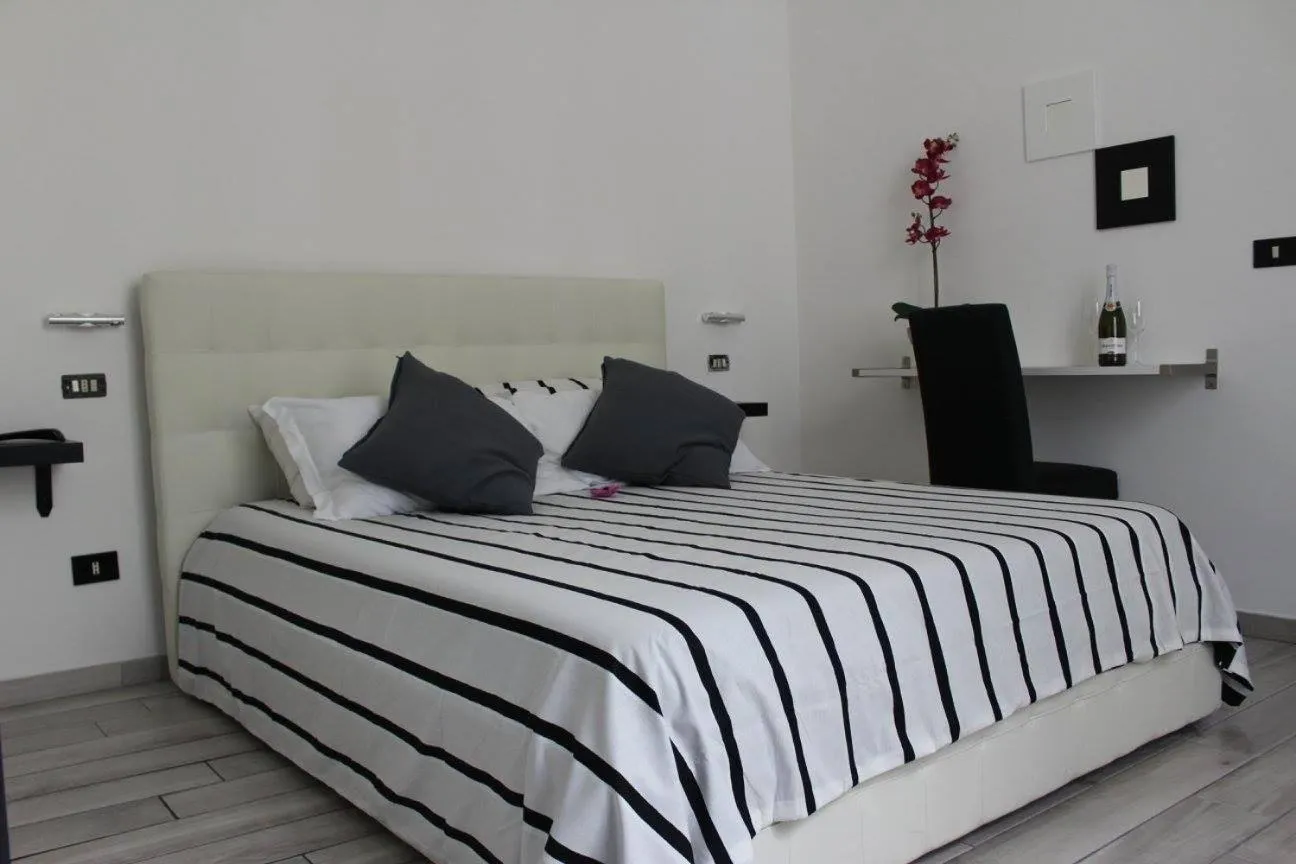 Bed in Lazy Gio Guest House