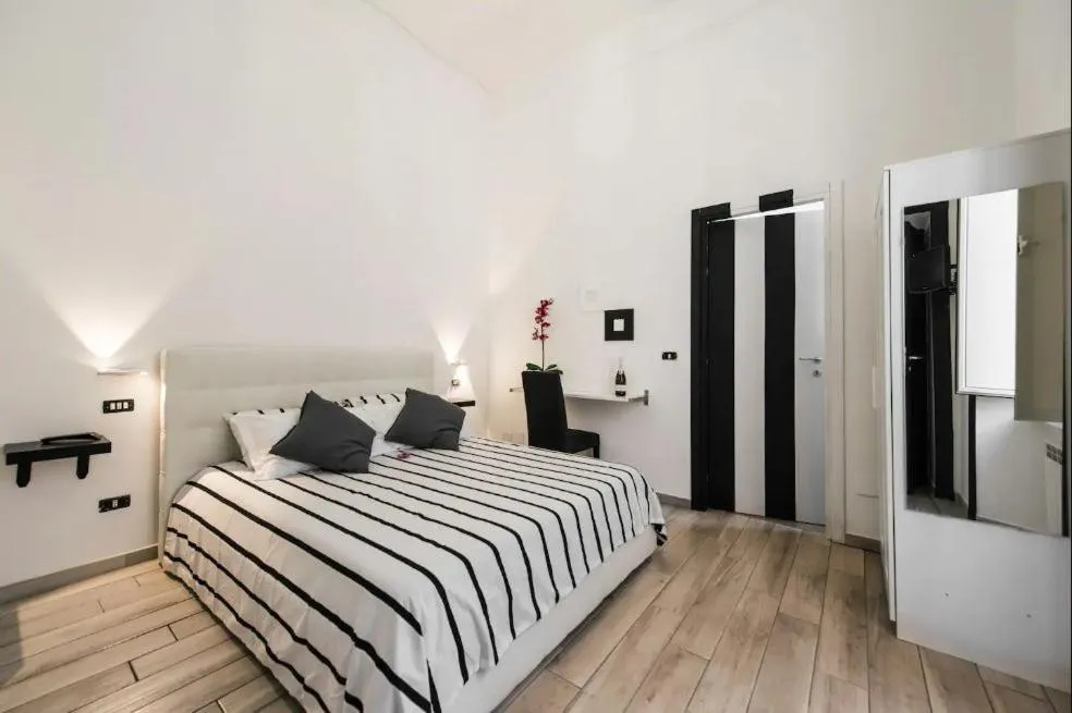 Bed in Lazy Gio Guest House