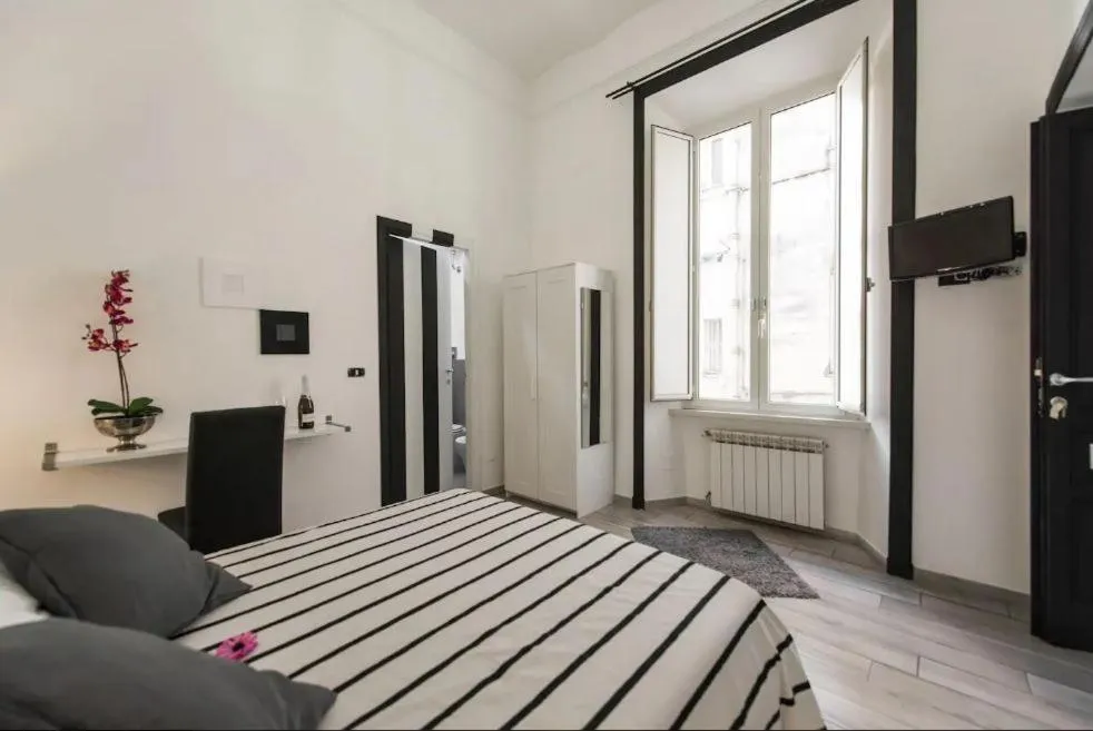 Bed in Lazy Gio Guest House