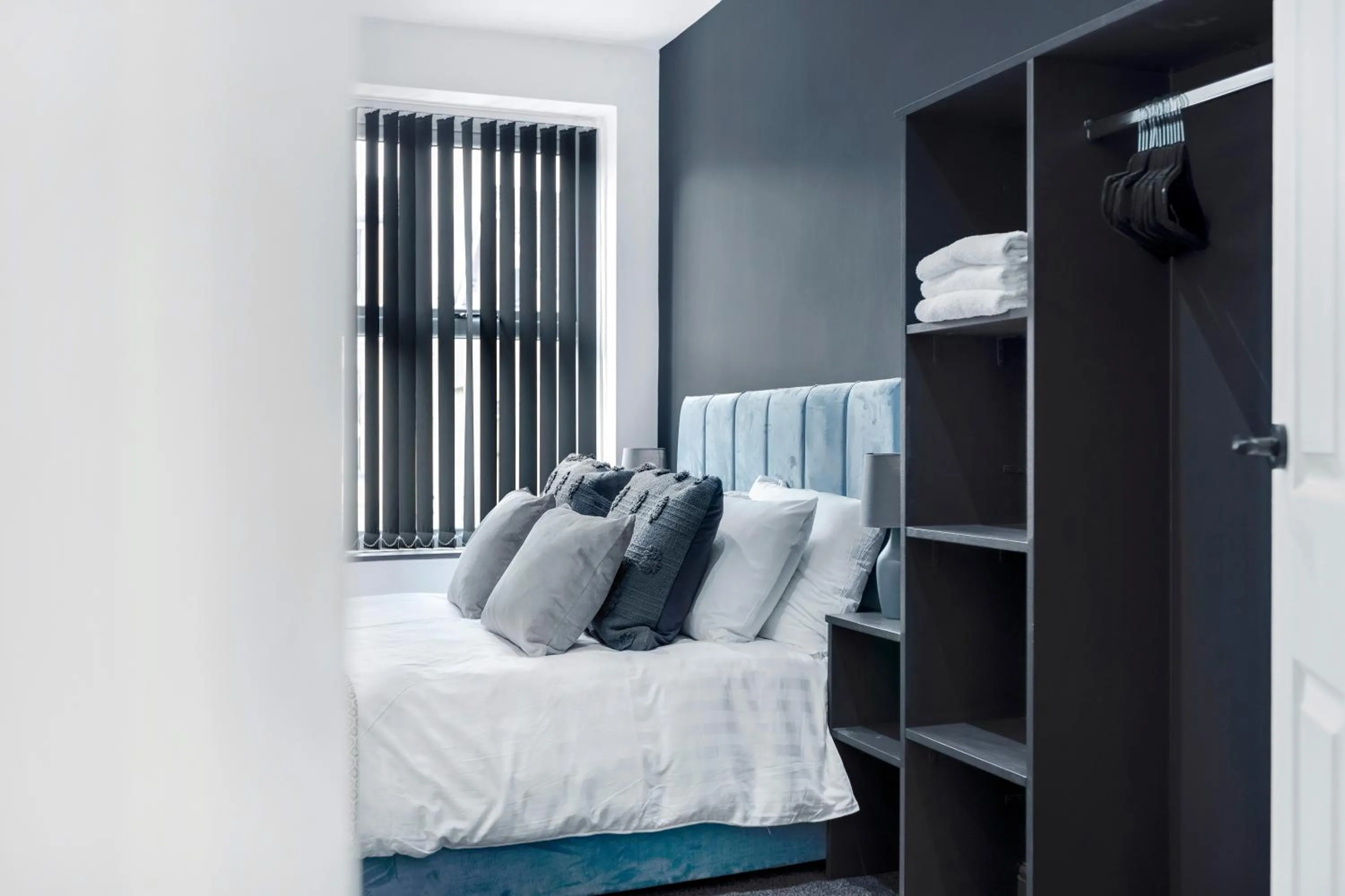 Bedroom, Bed in Wellington Suites by Sasco Apartments