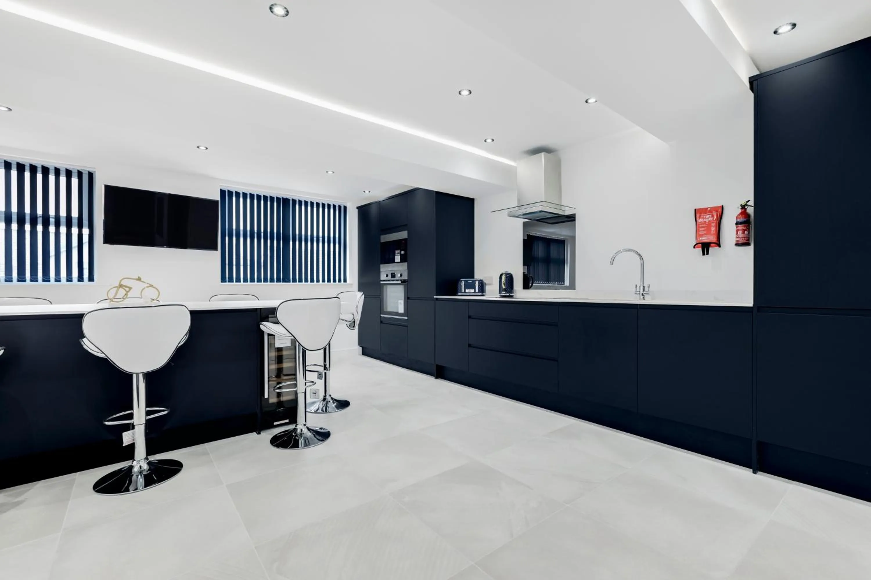 Kitchen or kitchenette in Wellington Suites by Sasco Apartments