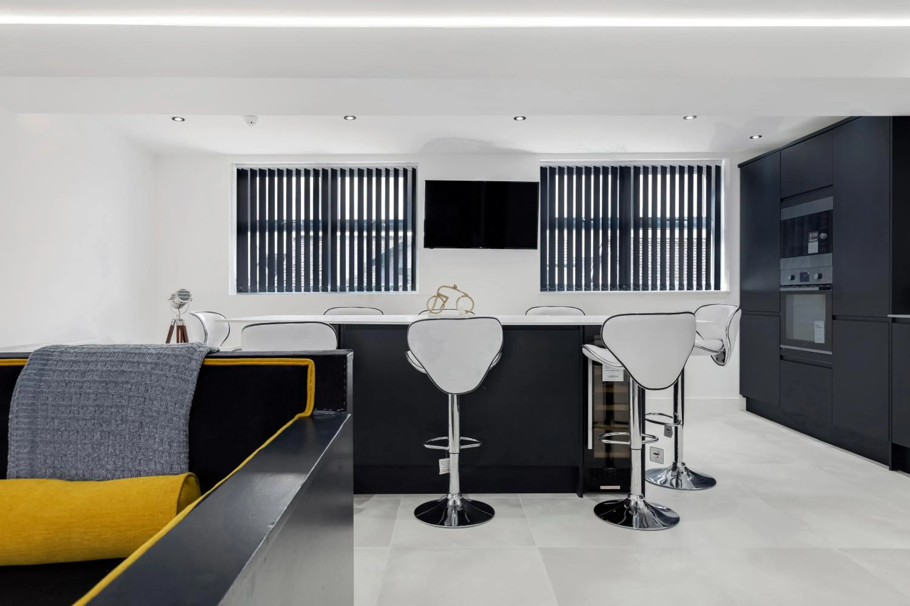 Kitchen or kitchenette in Wellington Suites by Sasco Apartments