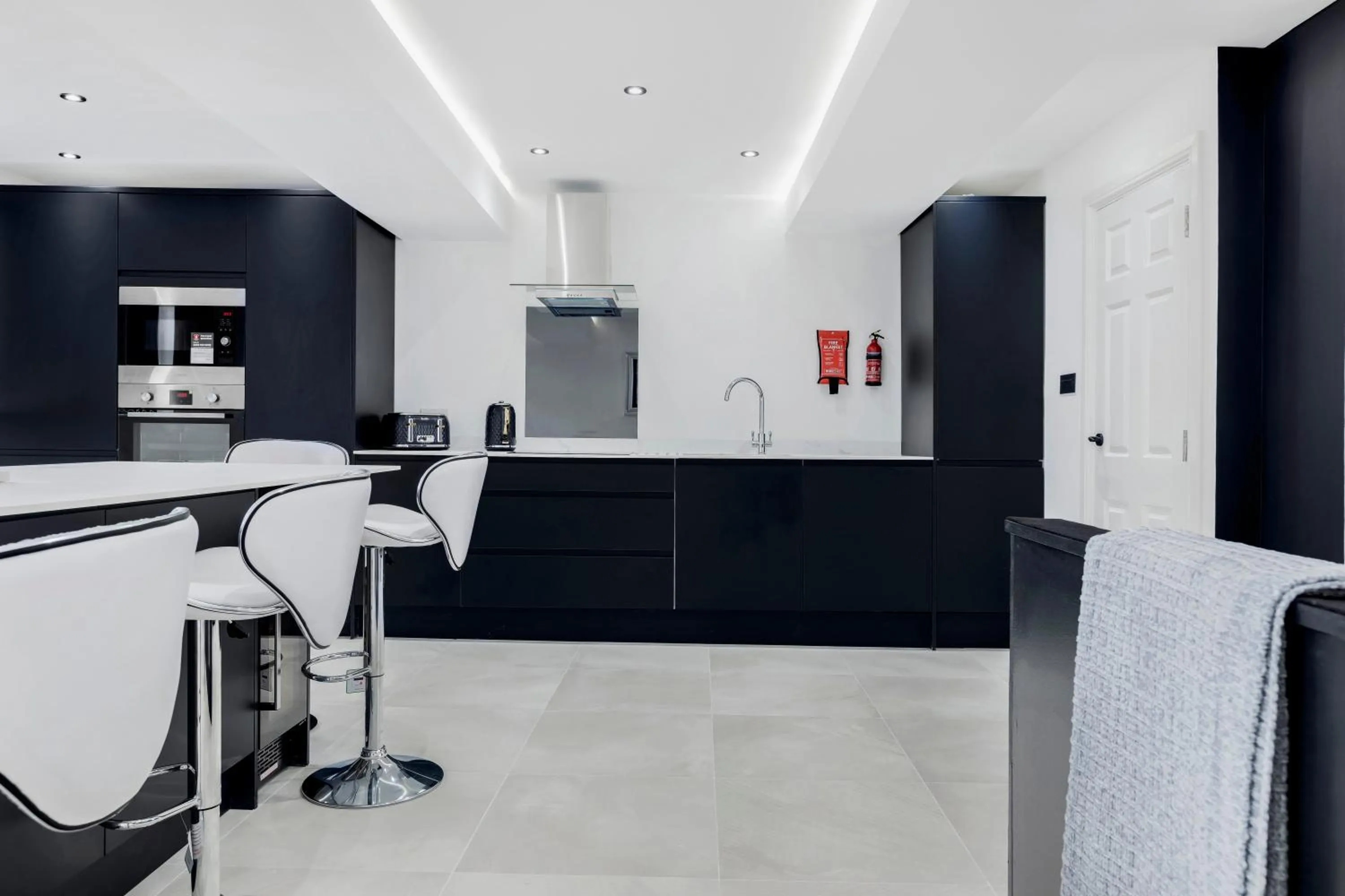 Kitchen or kitchenette in Wellington Suites by Sasco Apartments