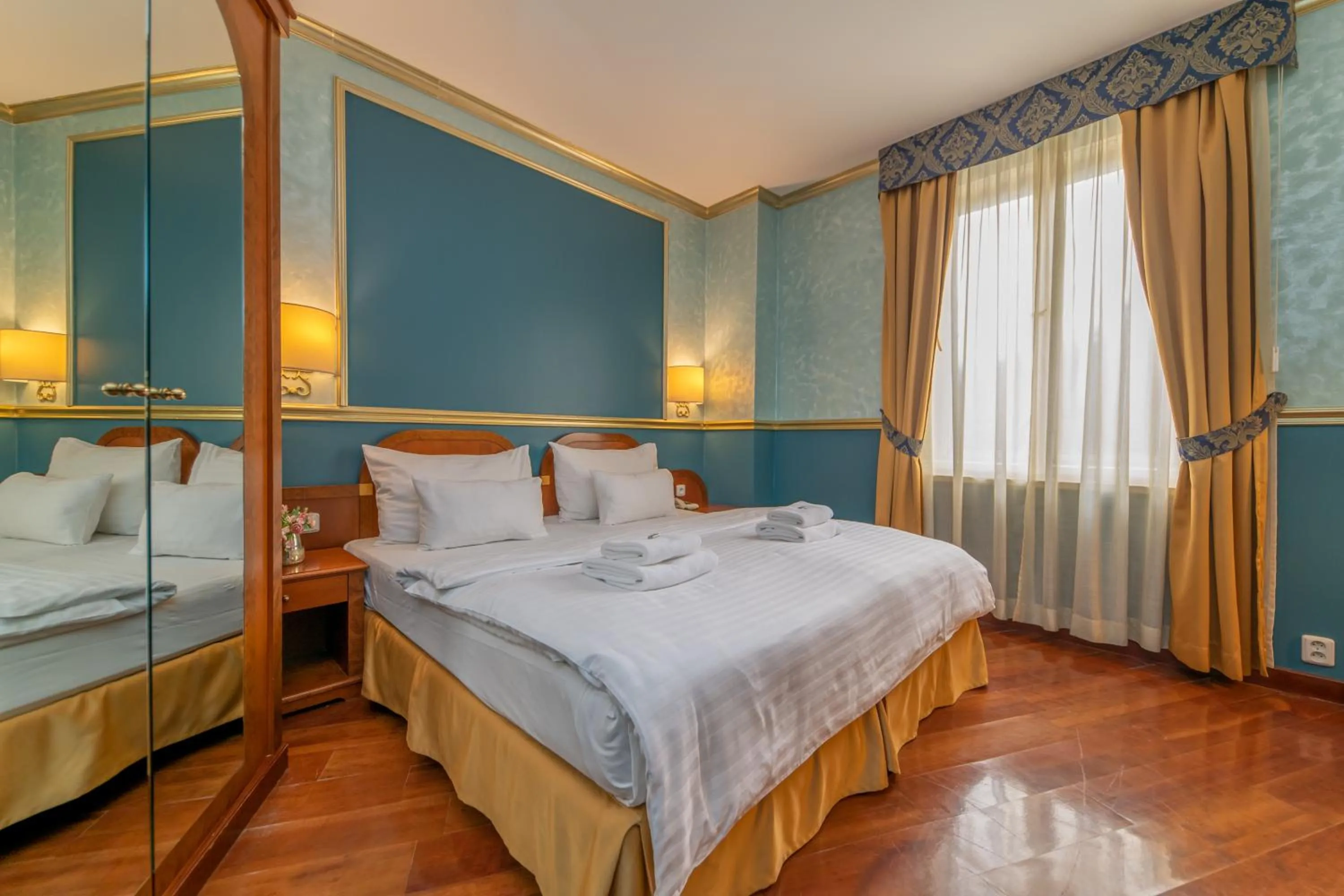 Bed in Hotel Kinsky Fountain