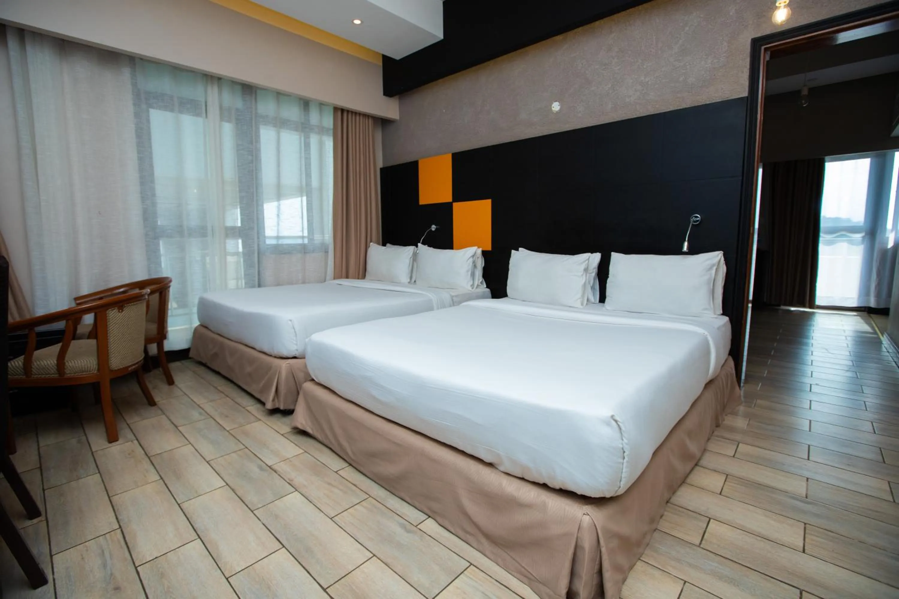 Bed in Gold Crest Hotel