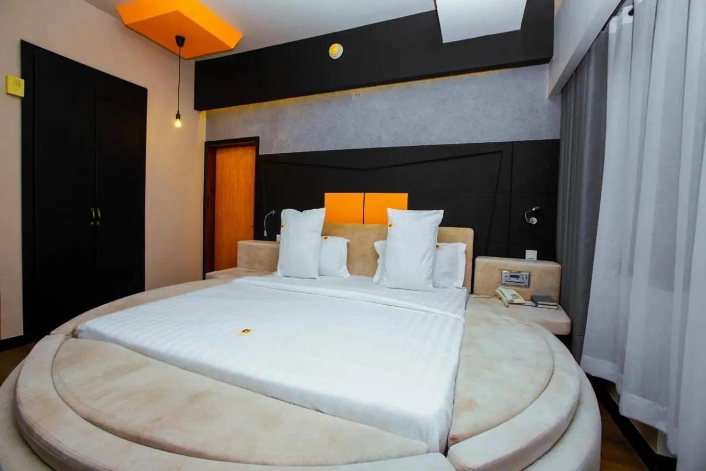 Bed in Gold Crest Hotel